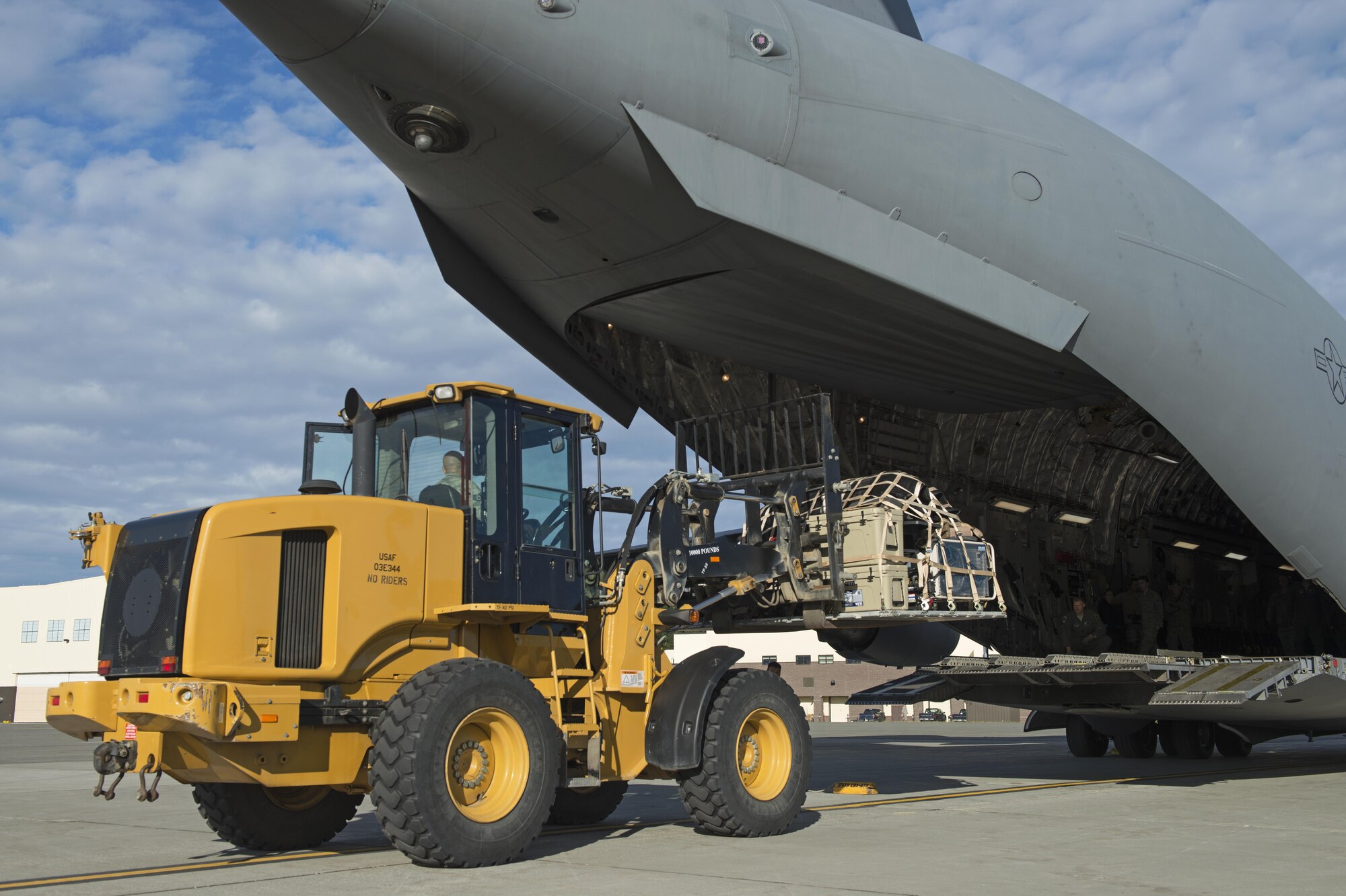 Airmen of the Alaska Air National Guard’s 176th Wing load and secure cargo onto a Joint Base Elmendorf-Richardson C-17 Globemaster III at JBER, Alaska, Aug. 28, 2017. The Airmen will travel to Houston, Texas as part of a humanitarian mission in response to Hurricane Harvey.