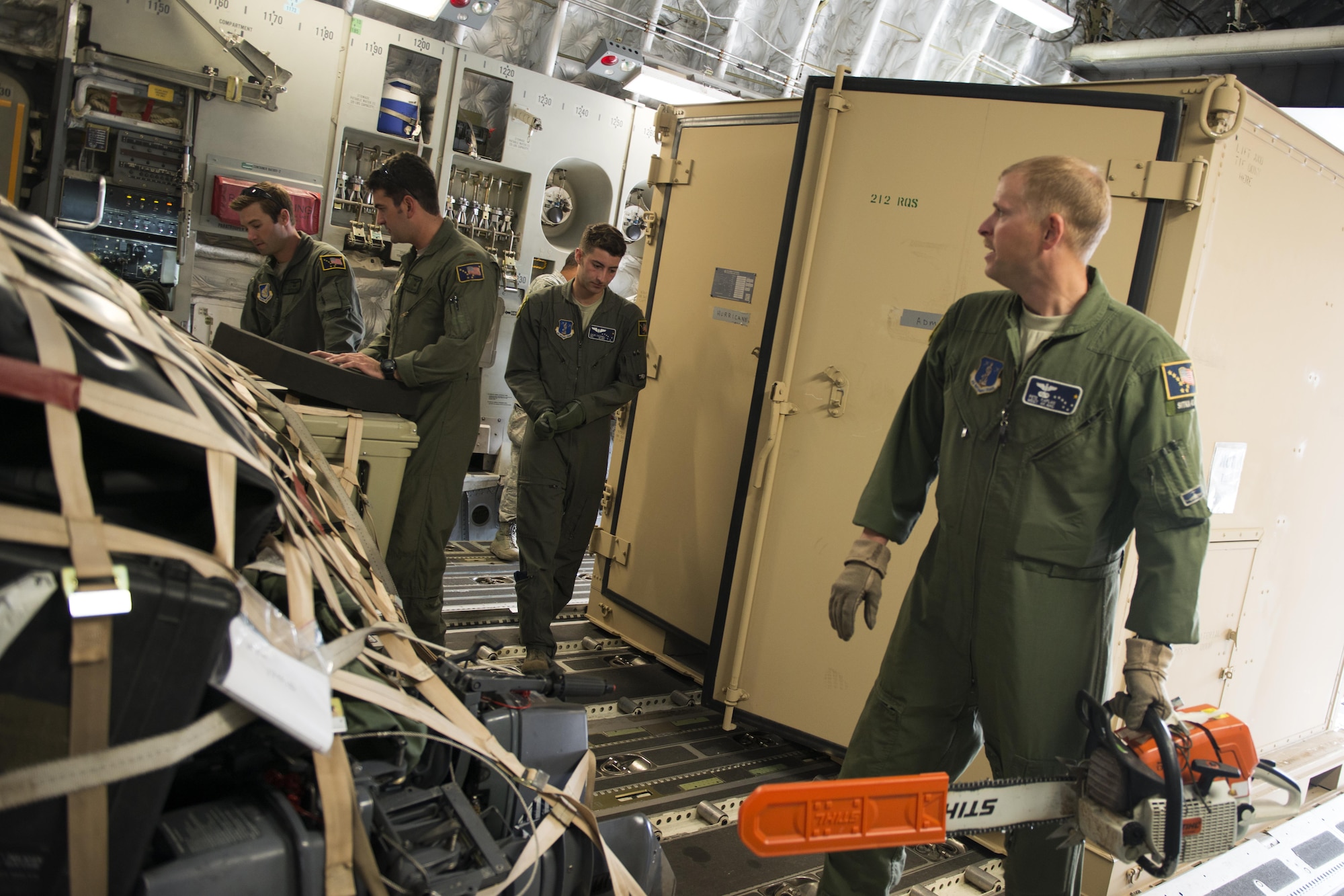 Airmen of the Alaska Air National Guard’s 176th Wing load and secure cargo onto a Joint Base Elmendorf-Richardson C-17 Globemaster III at JBER, Alaska, Aug. 28, 2017. The Airmen will travel to Houston, Texas as part of a humanitarian mission in response to Hurricane Harvey.