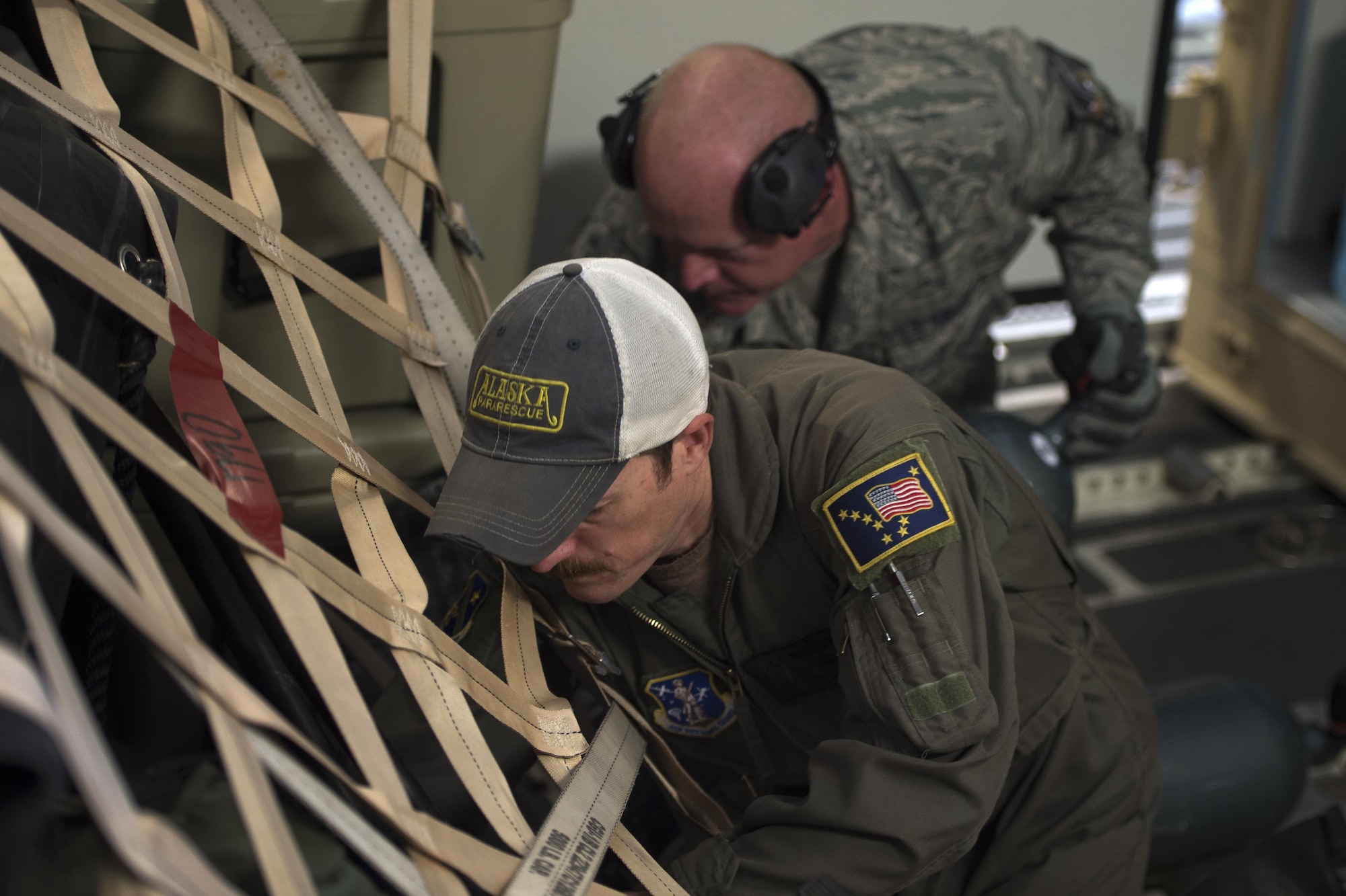 Airmen of the Alaska Air National Guard’s 176th Wing load and secure cargo onto a Joint Base Elmendorf-Richardson C-17 Globemaster III at JBER, Alaska, Aug. 28, 2017. The Airmen will travel to Houston, Texas as part of a humanitarian mission in response to Hurricane Harvey.