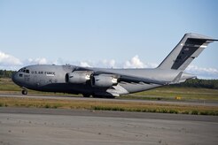 A Joint Base Elmendorf-Richardson C-17 Globemaster III accelerates for take-off on the flightline at JBER, Alaska, Aug. 28, 2017. Airmen of the Alaska Air National Guard’s 176th Wing will travel to Houston, Texas as part of a humanitarian mission in response to Hurricane Harvey.