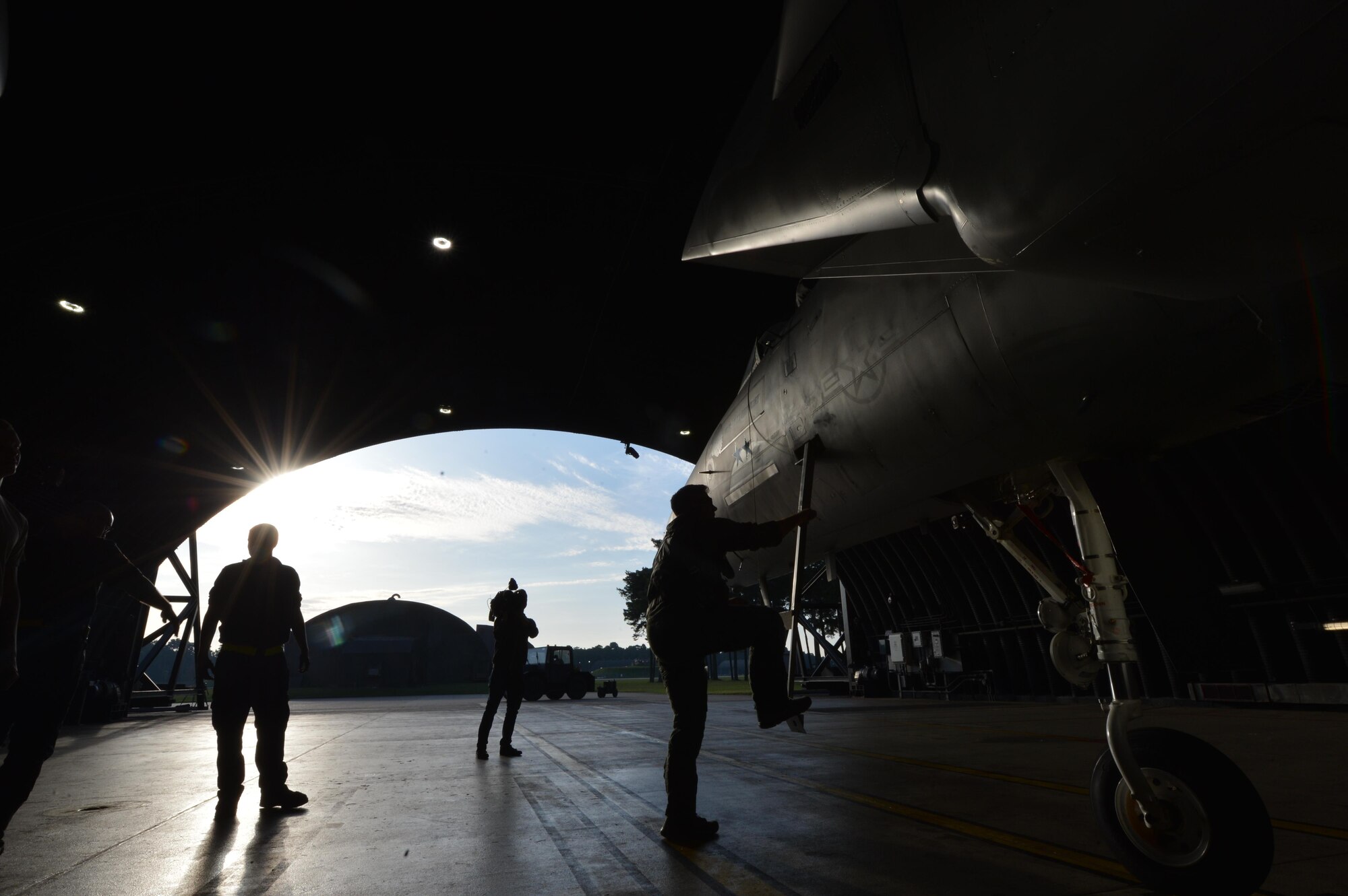 A pilot from the 493rd Fighter Squadron climbs into an F-15C Eagle prior to departing Royal Air Force Lakenheath, England, Aug. 29, 2017. The 48th Fighter Wing has deployed approximately 140 Airmen and seven F-15C Eagles to Siauliai Air Base, Lithuania to assume control of the NATO Baltic Air Policing peacetime collective defense mission. (U.S. Air Force photo/Master Sgt. Eric Burks)