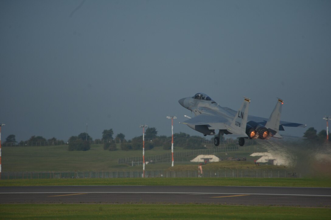 An F-15C Eagle assigned to the 493rd Fighter Squadron takes off from Royal Air Force Lakenheath, England, Aug. 29, 2017. The 48th Fighter Wing has deployed approximately 140 Airmen and seven F-15C Eagles as the 48th Air Expeditionary Group to Siauliai Air Base, Lithuania to assume control of the NATO Baltic Air Policing peacetime collective defense mission. (U.S. Air Force photo/Master Sgt. Eric Burks)