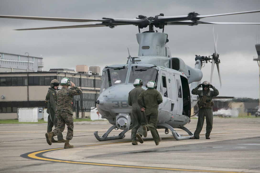 Marines with Detachment A, Marine Light Attack Helicopter Squadron 773, Marine Aircraft Group 49, 4th Marine Aircraft Wing, Marine Forces Reserve, prepare a Bell UH-1Y Venom for takeoff in support of rescue mission in wake of Hurricane Harvey, Aug. 28, 2017, from Belle Chasse, Louisiana.
