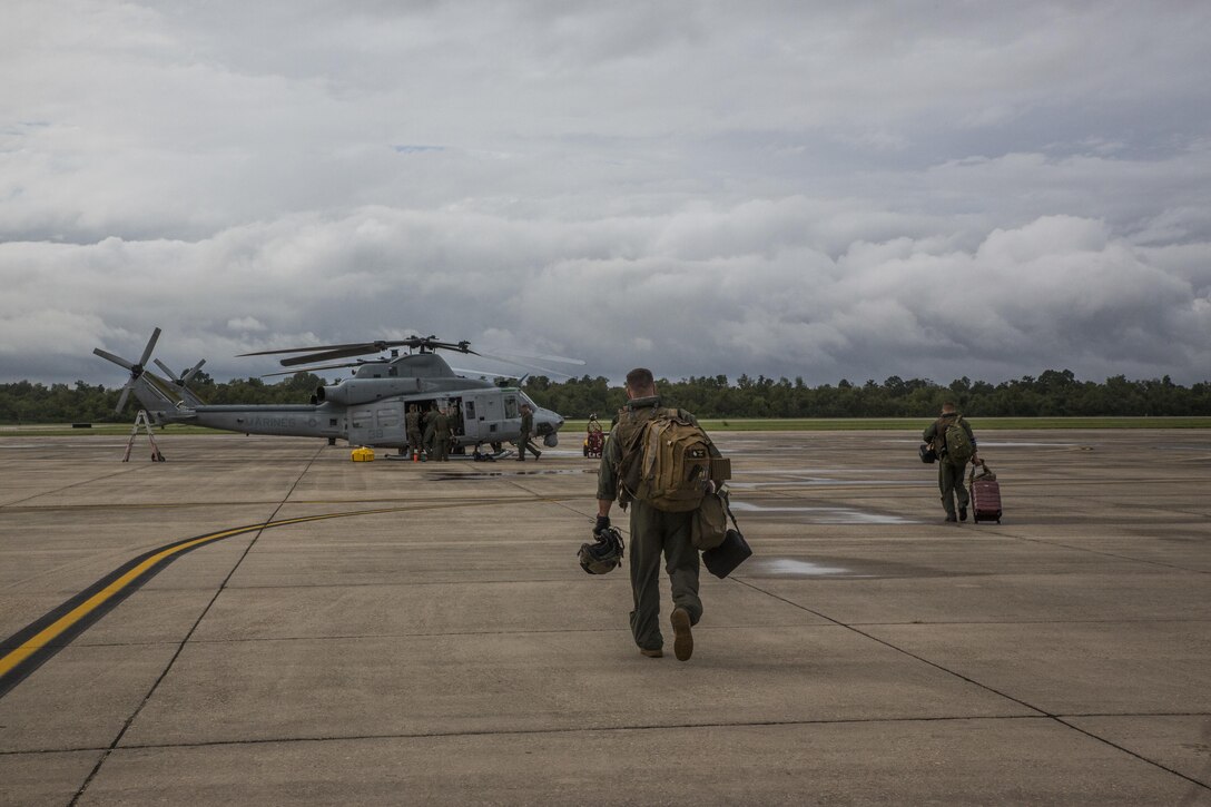 Marines from Detachment A, Marine Light Attack Helicopter Squadron 773, Marine Aircraft Group 49, 4th Marine Aircraft Wing, Marine Forces Reserve, prepare a Bell UH-1Y Venom for takeoff in support of rescue missions in wake of Hurricane Harvey, Aug. 28, 2017, from Belle Chasse, Louisiana.