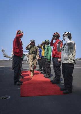 ARABIAN GULF (Aug. 24, 2017) U.S. Army Gen. Joseph Votel, commander, U.S. Central Command, is piped aboard the aircraft carrier USS Nimitz (CVN 68) by  sideboys, Aug. 24, 2017, in the Arabian Gulf. Nimitz is deployed in the U.S. 5th Fleet area of operations in support of Operation Inherent Resolve. While in this region, the ship and strike group are conducting maritime security operations to reassure allies and partners, preserve freedom of navigation, and maintain the free flow of commerce. (U.S. Navy photo by Mass Communication Specialist Seaman Emily Johnston)