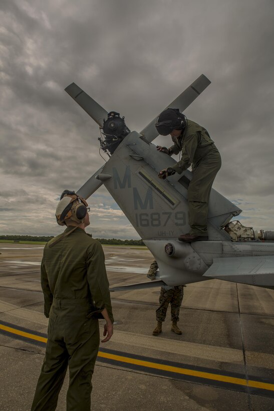Marines from Detachment A, Marine Light Attack Helicopter Squadron 773, Marine Aircraft Group 49, 4th Marine Aircraft Wing, Marine Forces Reserve, prepare the Bell UH-1Y Venom in support of Hurricane Harvey on Aug. 28, 2017 from Belle Chasse, La.