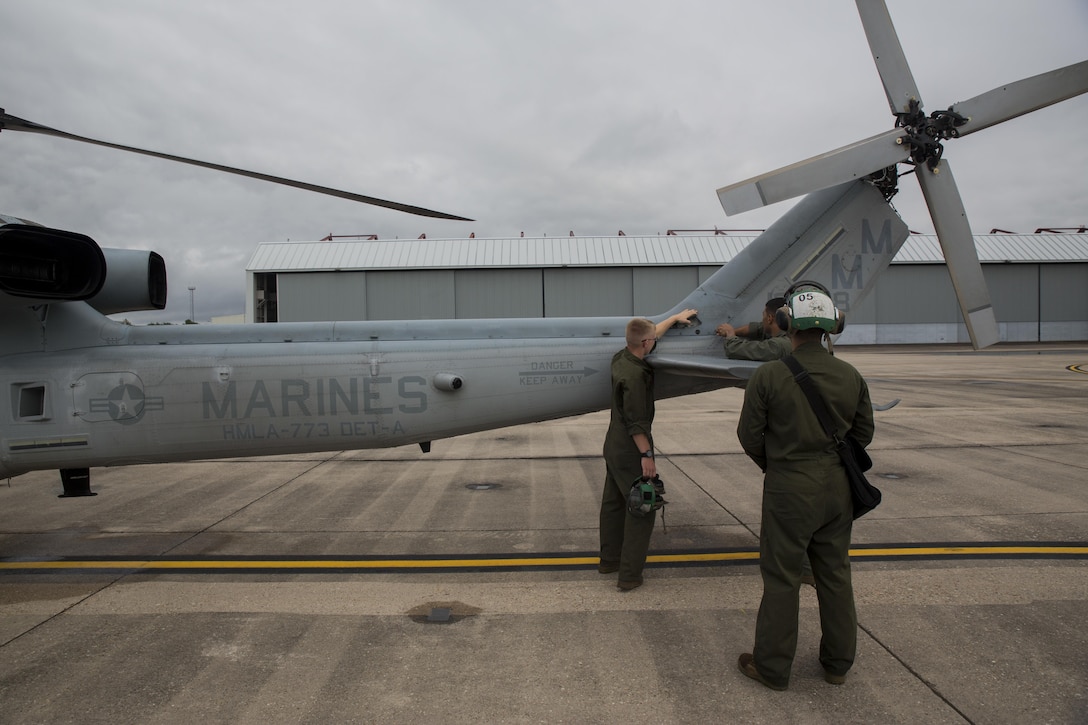 Marines from Detachment A, Marine Light Attack Helicopter Squadron 773, Marine Aircraft Group 49, 4th Marine Aircraft Wing, Marine Forces Reserve, prepare a Bell UH-1Y Venom for takeoff in support of rescue missions in wake of Hurricane Harvey, Aug. 28, 2017, from Belle Chasse, Louisiana.