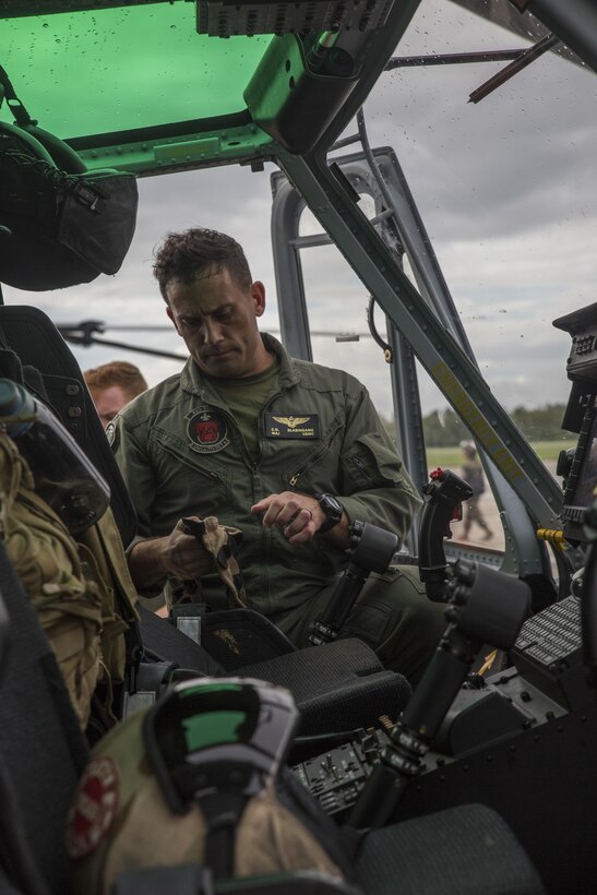 Maj. Cassey Blasingame a pilot with Detachment A, Marine Light Attack Helicopter Squadron 773, Marine Aircraft Group 49, 4th Marine Aircraft Wing, Marine Forces Reserve, prepares to takeoff in support of rescue missions in wake of Hurricane Harvey, Aug. 28, 2017, from Belle Chasse, Louisiana.