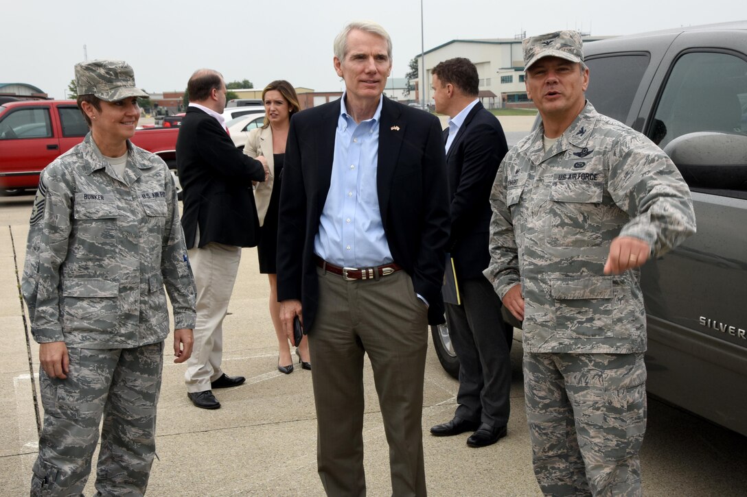 U.S. Sen. Rob Portman is greeted by Col. John Knabel, 178th Wing Commander and Chief Master Sgt. Heidi Bunker, 178th Wing Command Chief Master Sgt. as he arrives at the 178th Wing, Springfield, Ohio for a tour of the wing's facilities Aug. 28.
This five-day tour is part of Portman's national defense tour across Ohio where he is scheduled to visit each of Ohio's military installations.