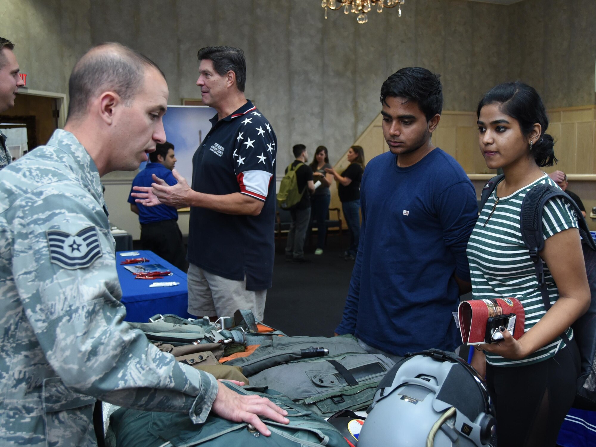 301st Fighter Wing Aircrew Flight Equipment personnel participate in the first Texas Christian University Air Force ROTC Detachment 845 Airpower Symposium at the University of Texas at Arlington, Friday, Aug. 25, 2017. AFE personnel explained the functionality of their life-saving equipment for pilots to symposium visitors. (U.S. Air Force photo by Tech. Sgt. Melissa Harvey)