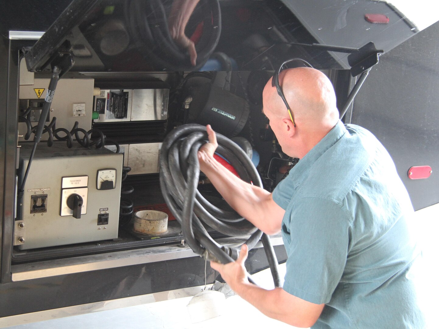 Matt Hopper, a telecommunications specialist for Task Force 51, Army North (Fifth Army), Joint Base San Antonio-Fort Sam Houston, conducts a vehicle inspection Aug. 28 of the sentinel mobile communication platform in preparation to provide support to civil authority in Houston from the aftermath of Hurricane Harvey. The sentinel can push information to customers within 15 to 30 minutes of arrival and fully set up within a few hours. TF-51 is deploying to Kelly Annex next to JBSA-Lackland to provide command and control over Title 10 assets, which will also provide support to civil authority. The mission of TF-51 is Army North’s contingency command post to conduct support for Defense Support of Civil Authority, or DSCA, homeland defense and theater security cooperation in order to promote the defense and security of the United States.