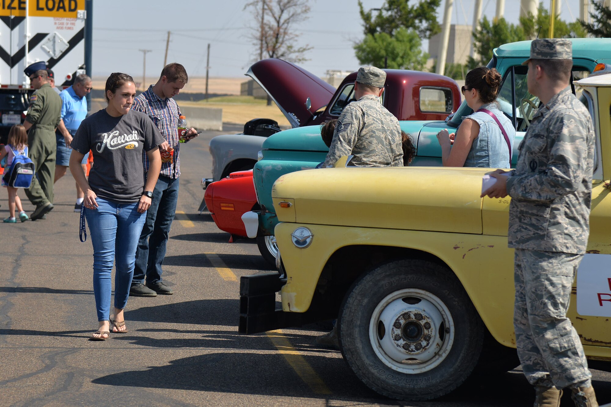 Guests view a car show during the annual base picnic Aug. 25, 2017, at Malmstrom Air Force Base, Mont.