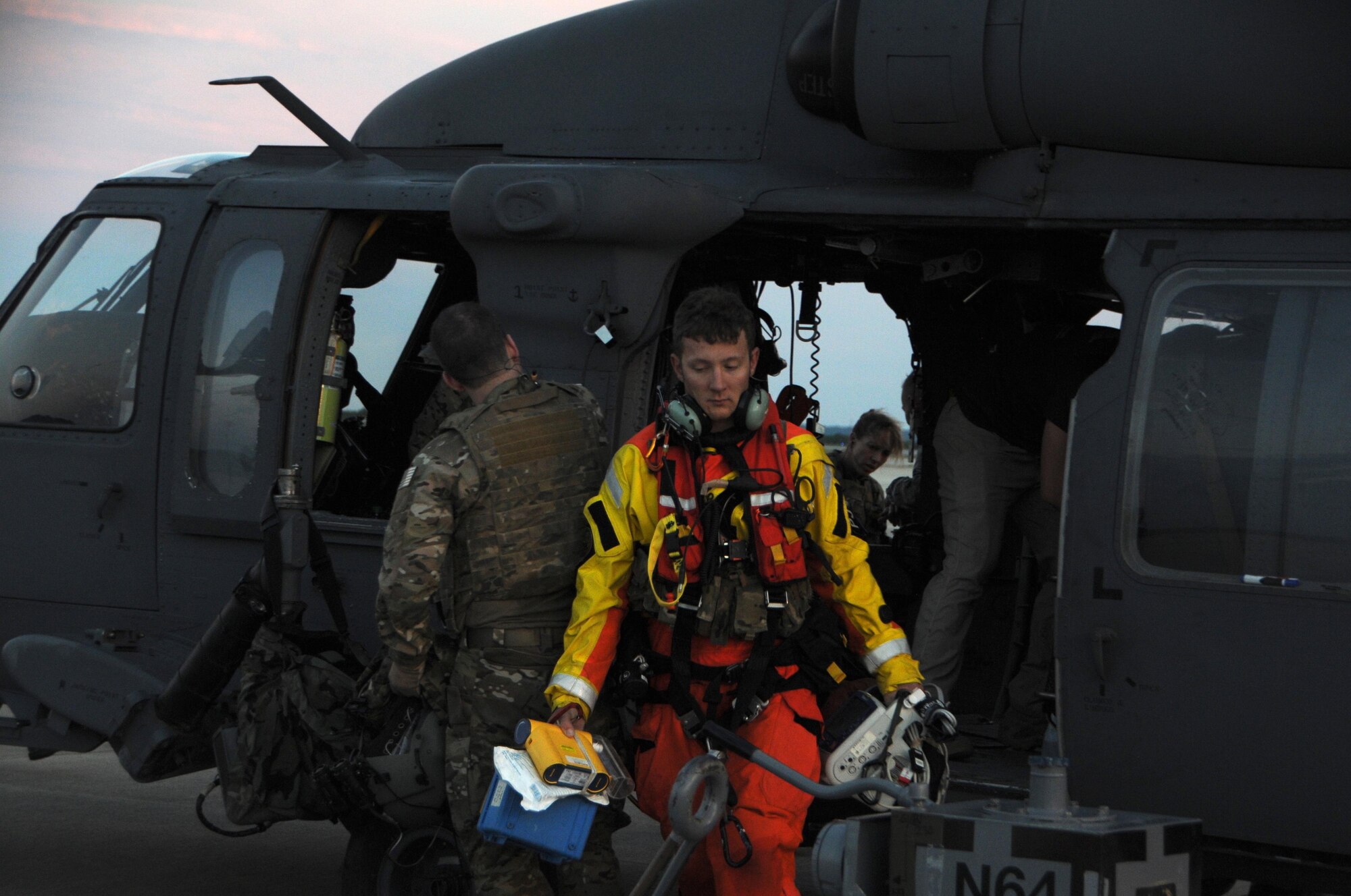 U.S. Air Force Senior Airman James N. Zambik, a pararescueman with the 103rd Rescue Squadron of the 106th Rescue Wing assigned to the New York Air National Guard, exits a HH-60 Pavehawk helicopter at Fort Hood, Texas, August 28, 2017. The efforts of Zambik and the Airmen of 106th helped save 255 people and two dogs during the day's response to Hurricane Harvey. (U.S. Air National Guard photo/Airman 1st Class Daniel H. Farrell)