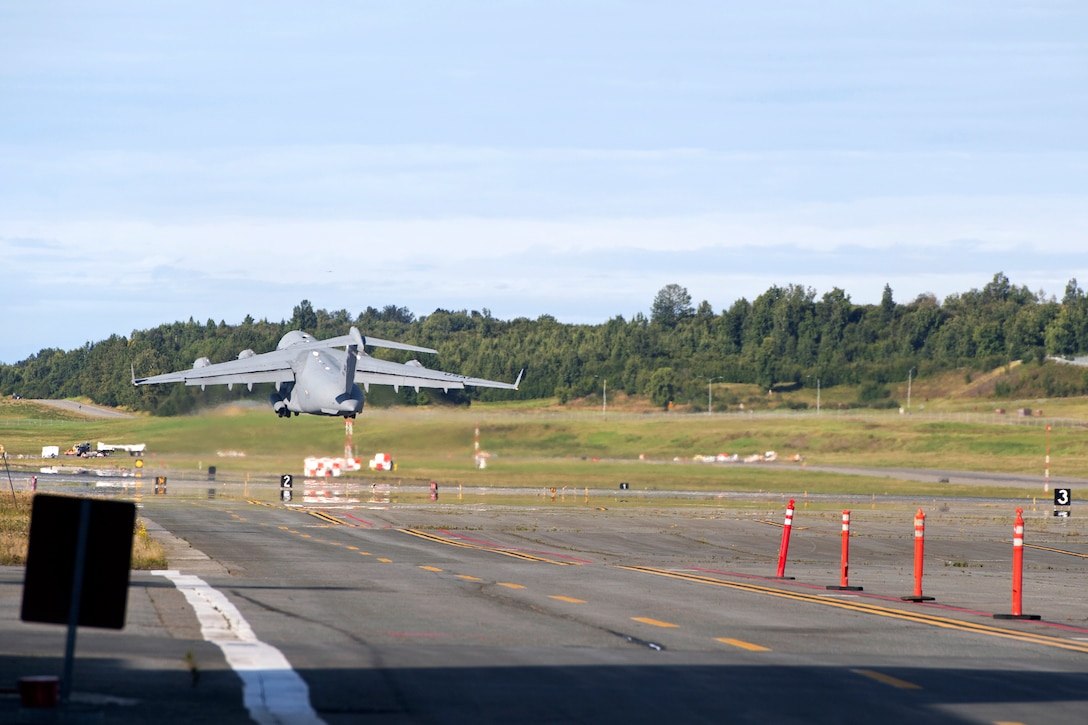 An airplane takes off from a runway.