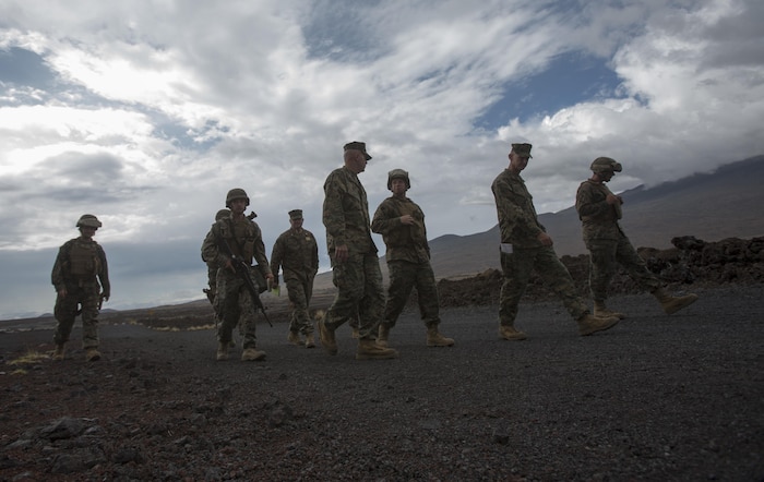 POHAKULOA TRAINING AREA, HAWAII – Lt. Gen. David Berger, commander of U.S. Marine Corps Forces, Pacific,  tours the forward arming and refueling point for Exercise Bougainville II at Pohakuloa Training Area, Aug. 21, 2017. Berger and a party of senior leadership met with junior Marines and leadership from various units taking part in the exercise, and observed day-to-day operations. Exercise Bougainville II prepares 3rd Battalion, 3rd Marine Regiment for service as a forward deployed force in the Pacific by training them to fight as a ground combat element in a Marine Air-Ground Task Force. (U.S. Marine Corps photo by Lance Cpl. Luke Kuennen)