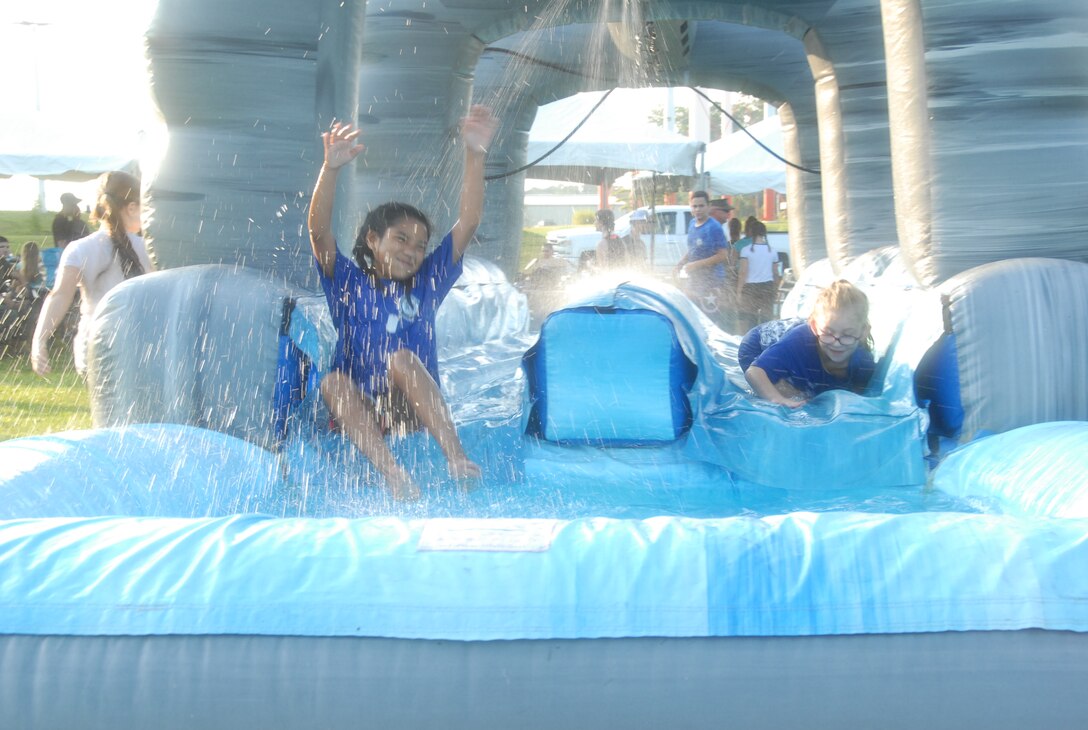 On August 18, 2017 MCES held a Kids Rock Day which allowed the MCES Marines and civilians the opportunity to bring their children to the Command. As part of the days events, three inflatable playgrounds were set up on Ellis Field.