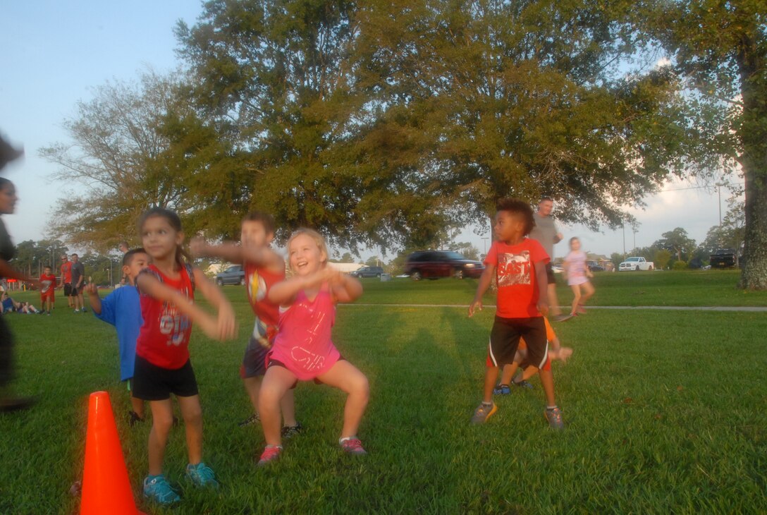 On August 18, 2017 MCES held its annual Kids Rock Day. The first event of the morning was a fartlek run and modified obstacle course. At each station along the fartlek course, a Marine demonstrated the exercise and the children mirrored the instructor.