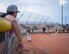 Aiden Smith, 96th Operations Support Squadron team, watches during his team’s at bat during the intramural softball championship game Aug. 28 at Eglin Air Force Base, Fla. The game pitted the 96th Maintenance Squadron team against the reigning championship, OSS team.  The Maintainers powerful bats and six homeruns won the game 17-15.  (U.S. Air Force photo/Samuel King Jr.)