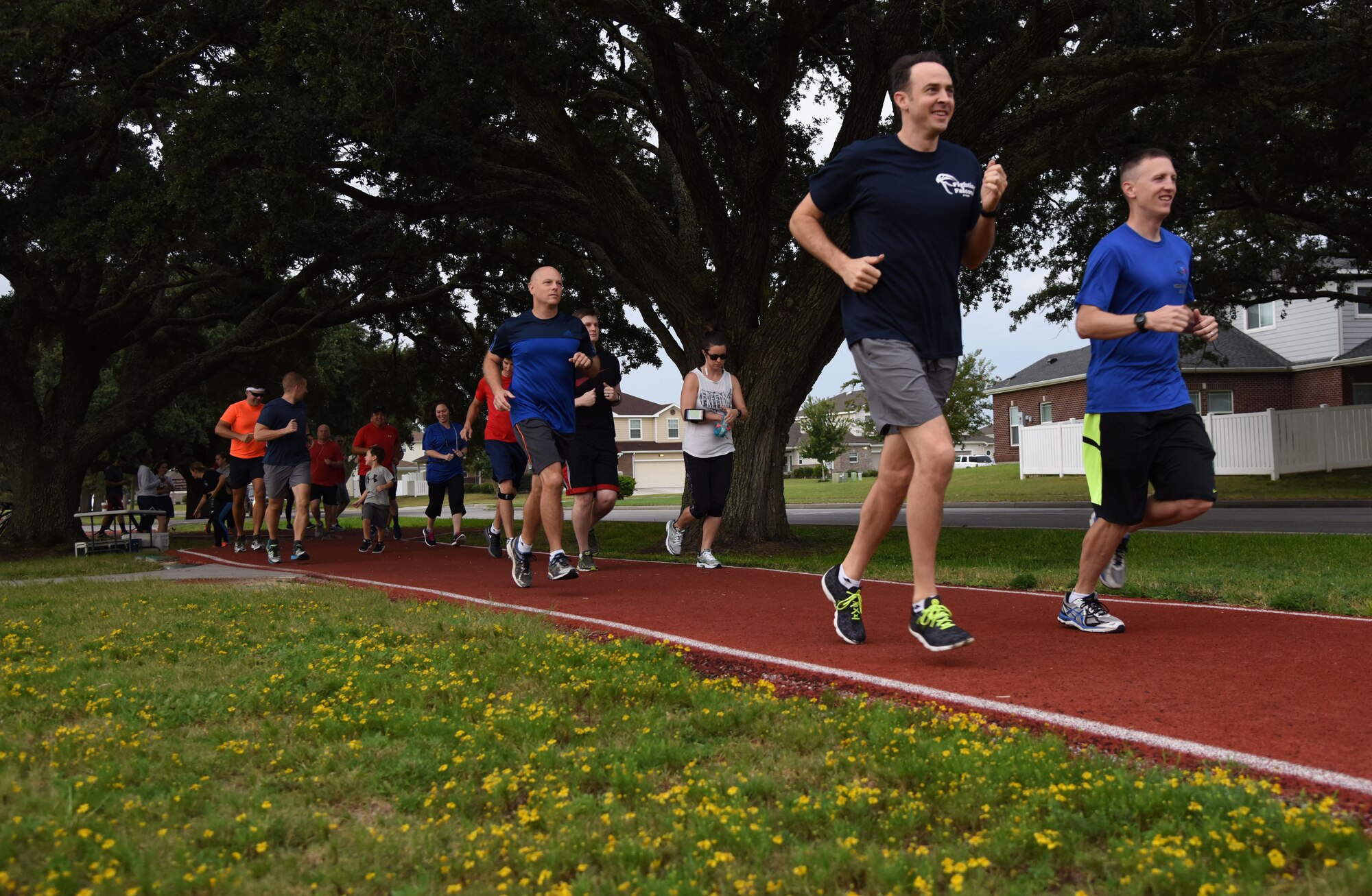 Keesler personnel participate in the Women’s Equality Day Celebration 5K Walk/Run on the I-81 track Aug. 28, 2017, on Keesler Air Force Base, Miss. Women’s Equality Day commemorates the 1920 certification of the 19th Amendment to the Constitution, granting women the right to vote. (U.S. Air Force photo by Kemberly Groue)