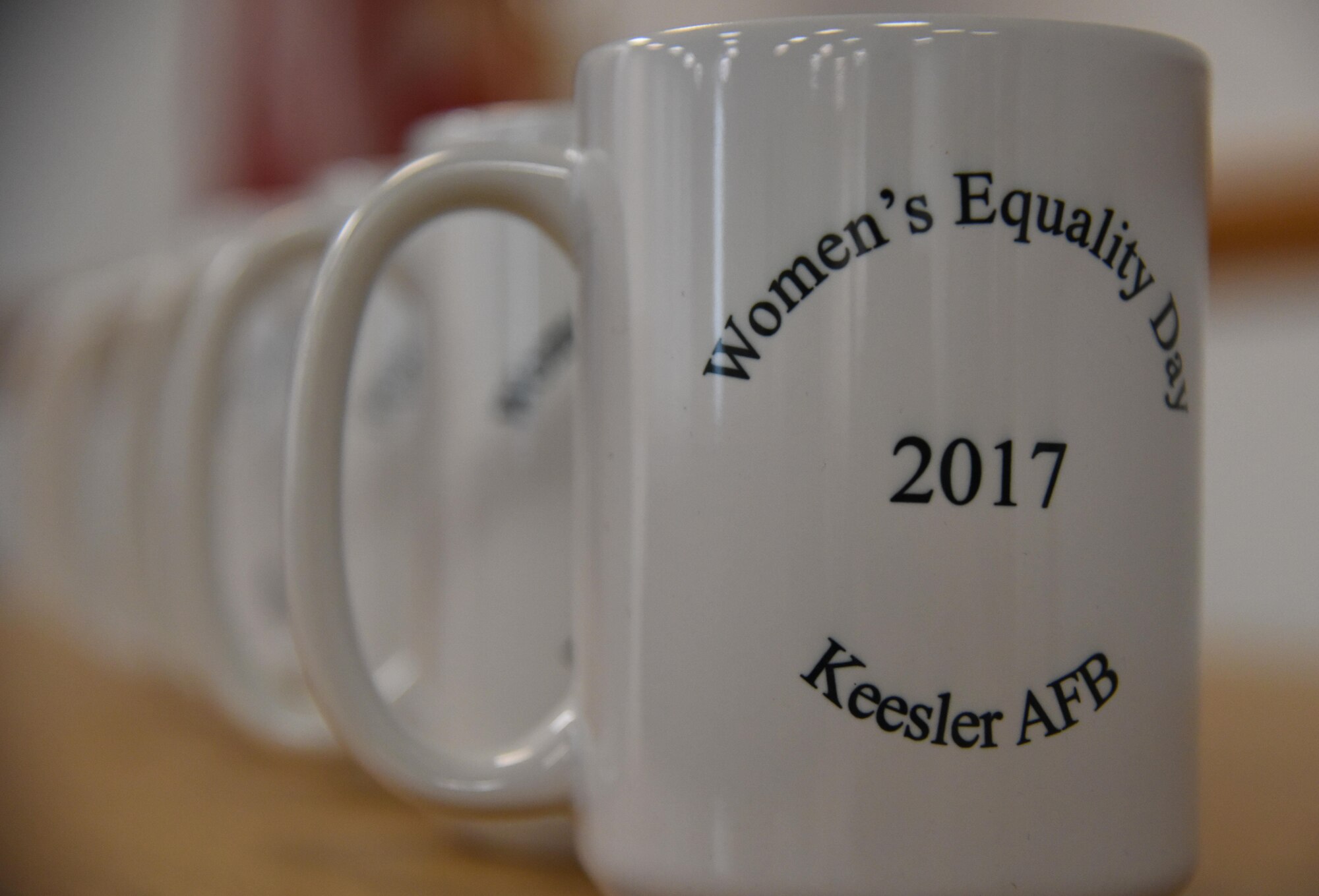 Coffee cups sit on display at the Women’s Equality Day Celebration Seminar inat the Sablich Center Aug. 28, 2017, on Keesler Air Force Base, Miss. Women’s Equality Day commemorates the 1920 certification of the 19th Amendment to the Constitution, granting women the right to vote. (U.S. Air Force photo by Kemberly Groue)