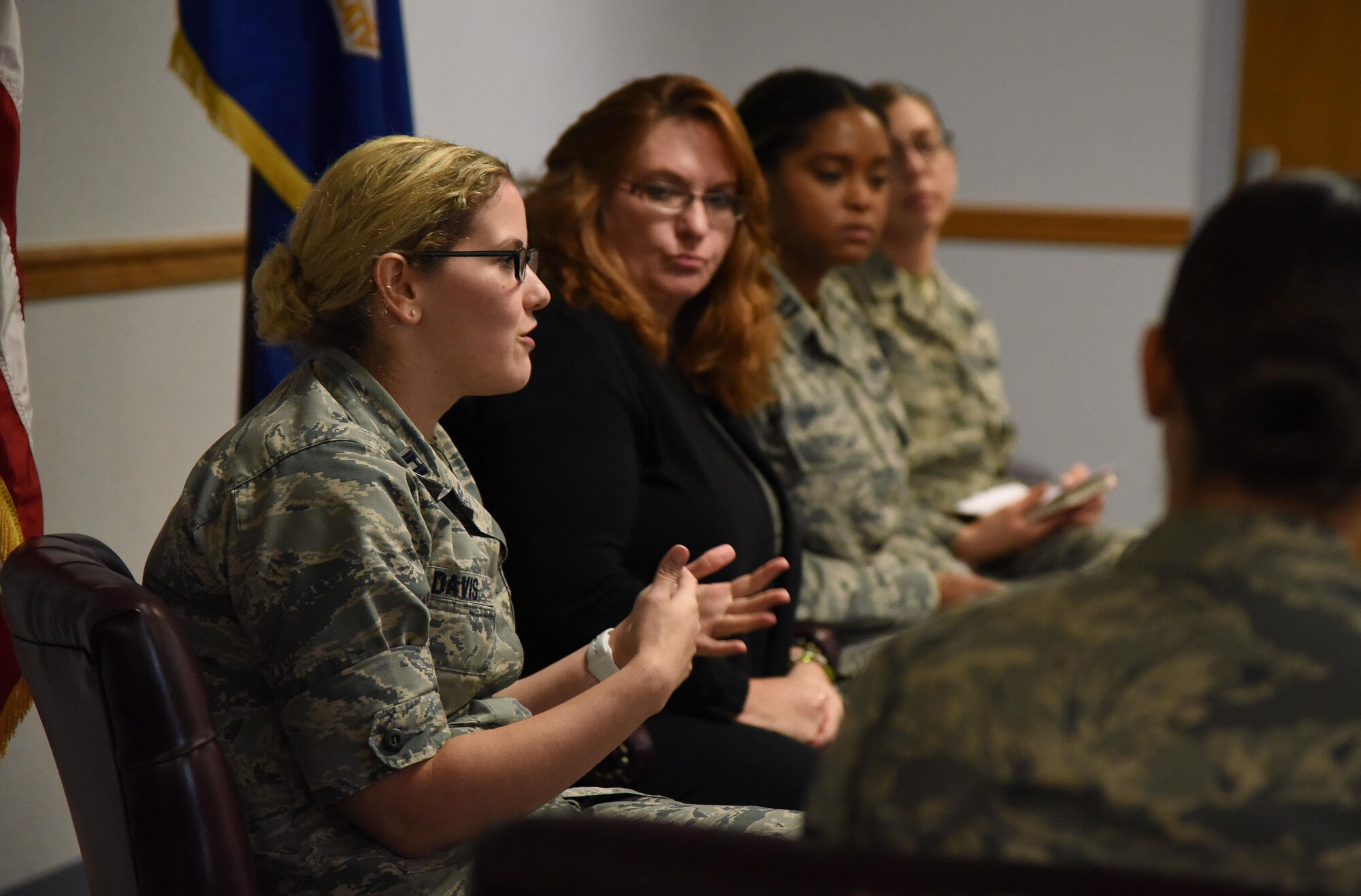 Capt. Erin Davis, 81st Training Wing assistant staff judge advocate, speaks during the Women’s Equality Day Celebration Seminar inat the Sablich Center Aug. 28, 2017, on Keesler Air Force Base, Miss. Women’s Equality Day commemorates the 1920 certification of the 19th Amendment to the Constitution, granting women the right to vote. (U.S. Air Force photo by Kemberly Groue)