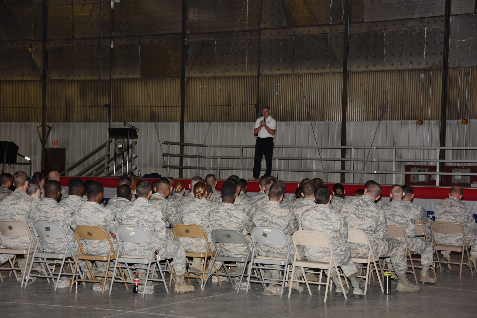 The 11th Chief Master Sergeant of the Air Force, retired, David J. Campanale, speaks to members of Grand Forks Air Force Base during an all call Aug. 25, 2017, on Grand Forks AFB, N.D. Following his tour of the base, Campanale was the guest speaker at this year’s Senior NCO induction ceremony. (U.S. Air Force photo by Senior Airman Cierra Presentado)