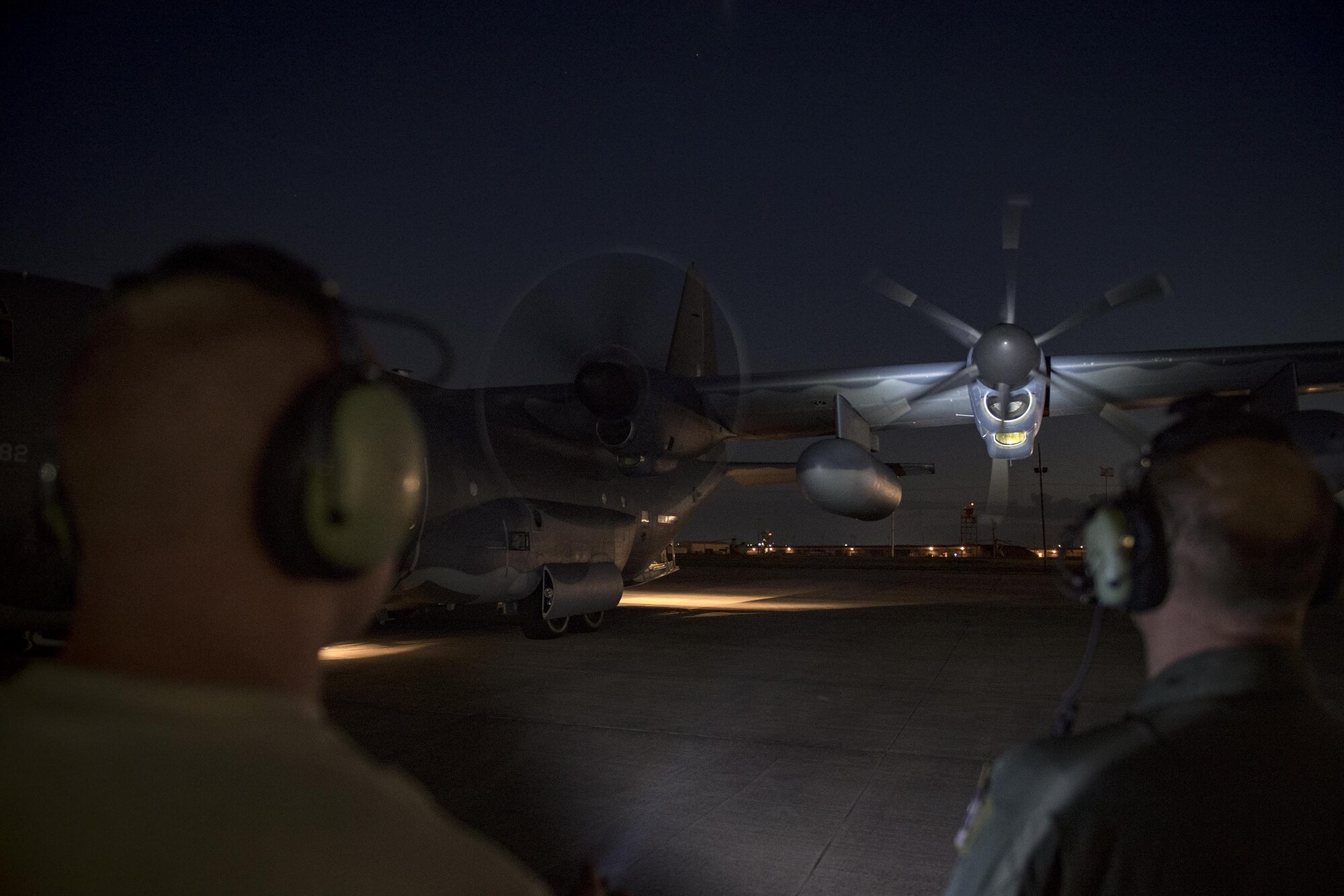 Maintainers and aircrew inspect an HC-130J Combat King II prior to a sortie in support of Hurricane Harvey relief efforts, Aug. 28, 2017, at Naval Air Station Fort Worth Joint Reserve Base, Texas. The 347th Rescue Group from Moody Air Force Base, Ga. sent aircraft and personnel in support of Air Forces Northern as part of Northern Command's support of FEMA's disaster response efforts. (U.S. Air Force photo by Staff Sgt. Ryan Callaghan)