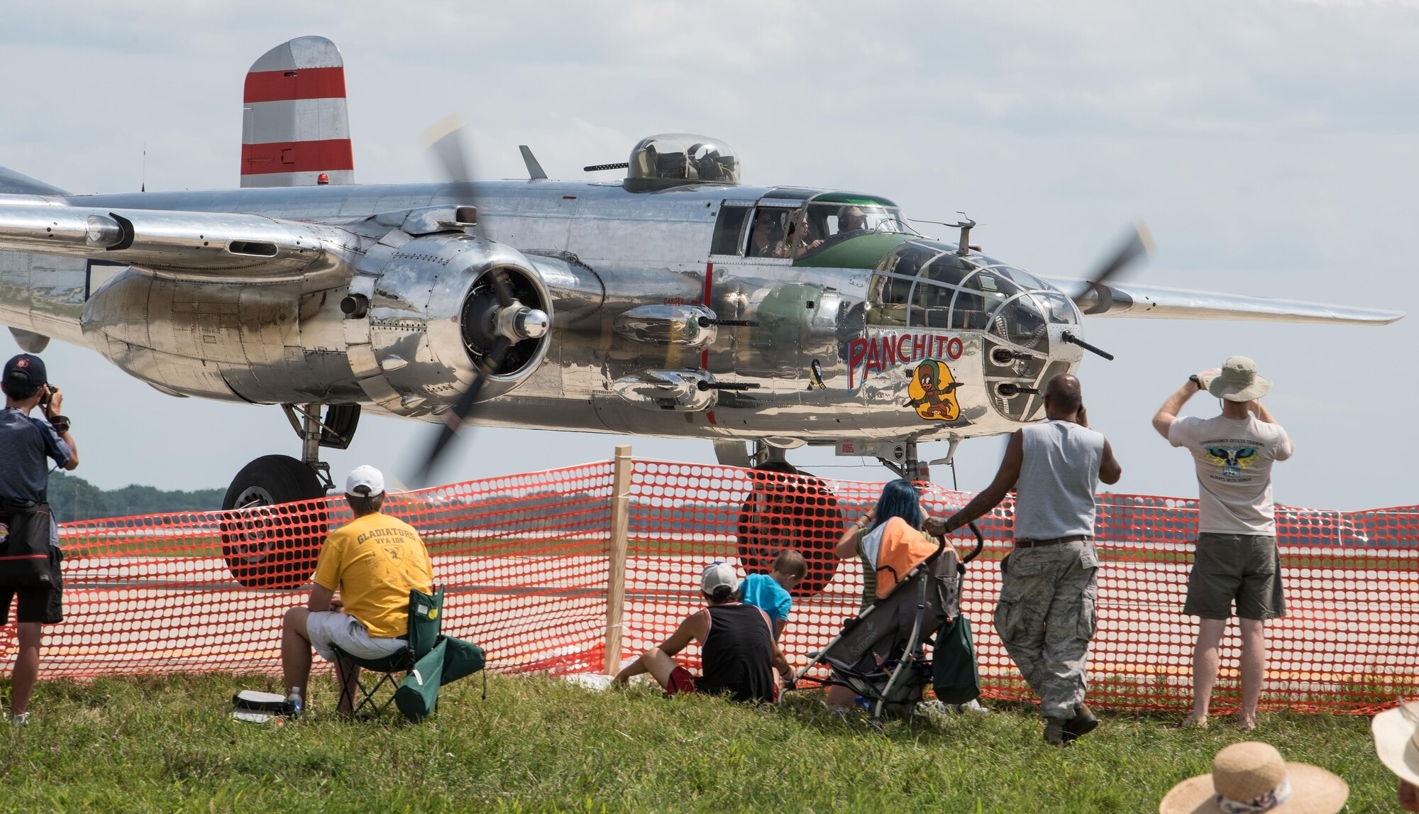 "Thunder Over Dover" spectators watch "Panchito," a Mitchell B-25 bomber, taxi in after an aerial demonstration, Aug. 27, 2017, on Dover Air Force Base, Del.  Dover AFB hosted an Open House featuring over 20 aircraft static displays, as well as numerous aerial demonstrations. (U.S. Air Force photo by Roland Balik)