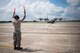 A member of the 803rd Aircraft Maintenance Squadron marshals in an 815th Airlift Squadron C-130J Super Hercules aircraft upon its return from exercise Patriot Warrior Aug. 23, 2017 at Keesler Air Force Base, Mississippi. (U.S. Air Force photo/Staff Sgt. Heather Heiney)