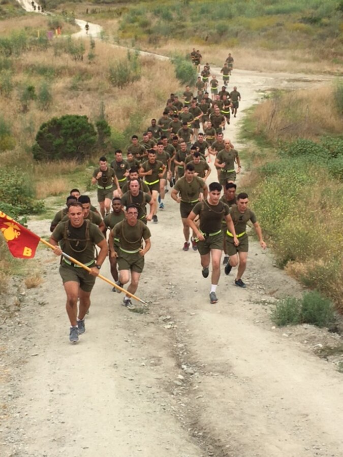 Bravo Company Conducts early morning PT to the top of cardiac hill during the company run.
