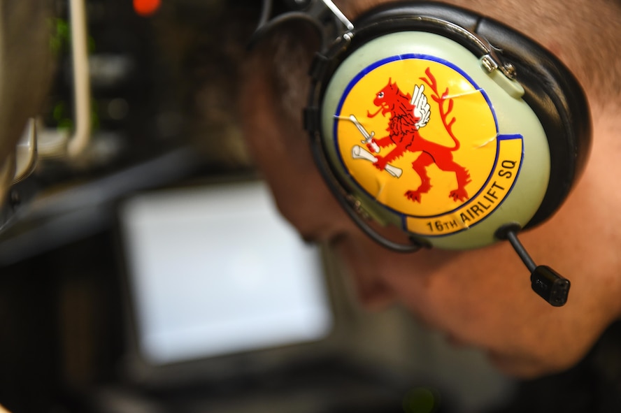 Aircrew from the 16th Airlift Squadron prepares for a mission in response to Hurricane Harvey Aug. 29. Preparations began Friday when four aircrews were placed into alert status in case the C-17 fleet here was called upon to aid in hurricane relief efforts. As the crews left, additional crews were placed into alert status and ready to launch in order to continue relief operations.