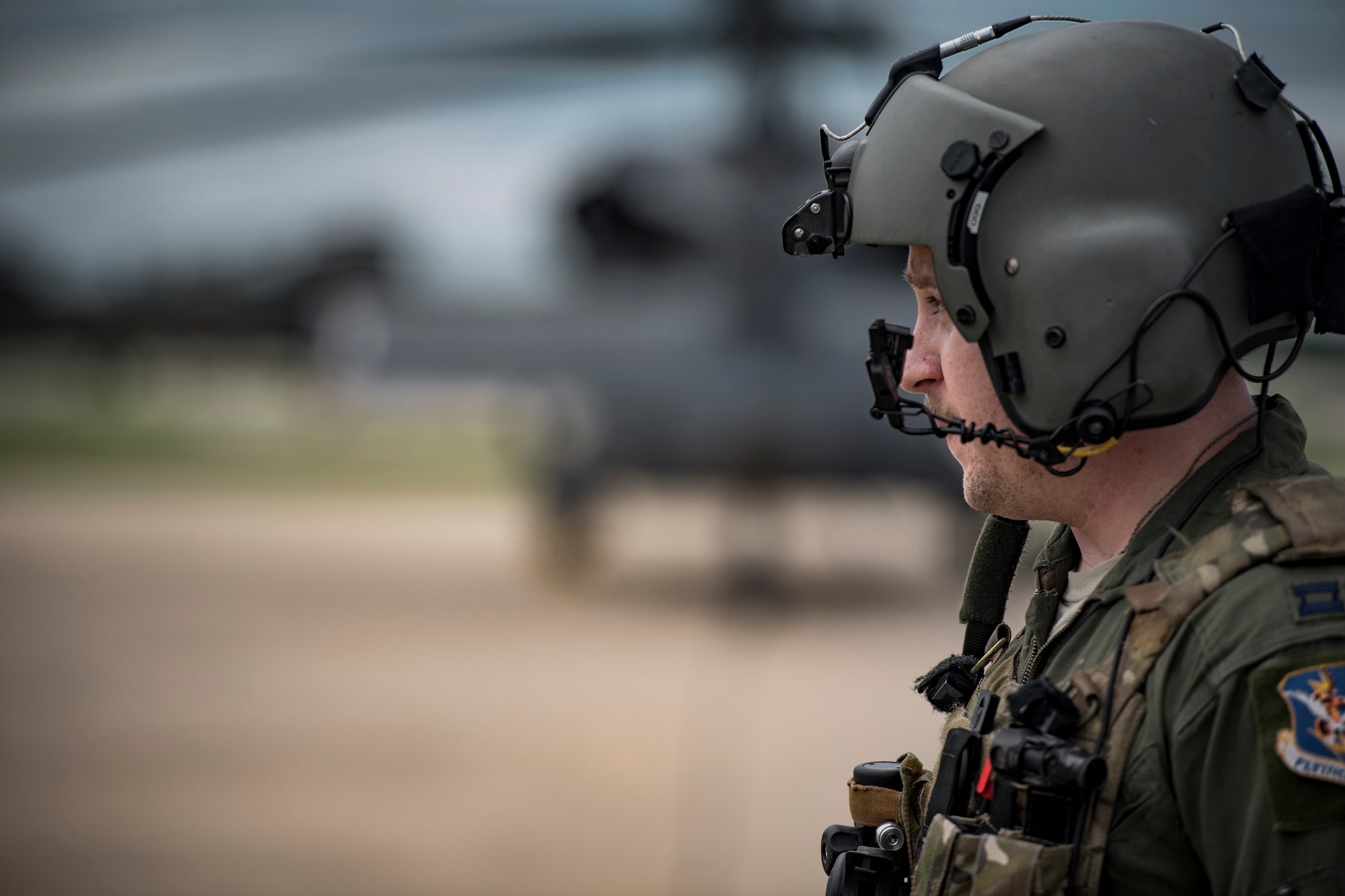 An HH-60G Pave Hawk pilot from the 41st Rescue Squadron walks across the flightline following a sortie in support of Hurricane Harvey relief efforts, Aug. 29, 2017, at Easterwood Airport, College Station, Texas.