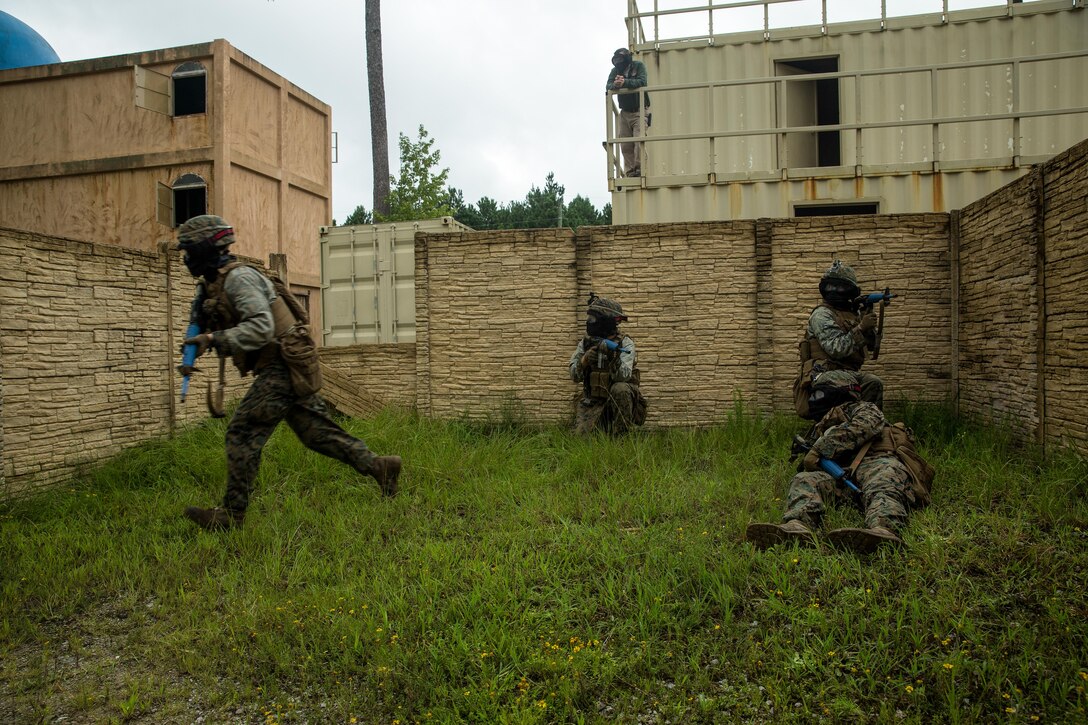 U.S. Marines with Battalion Landing Team 2nd Battalion, 6th Marine Regiment, 26th Marine Expeditionary Unit (MEU), conduct force-on-force Military Operations in Urban Terrain (MOUT) training as part of Realistic Urban Training (RUT) at Camp Lejeune, N.C., Aug. 24, 2017.