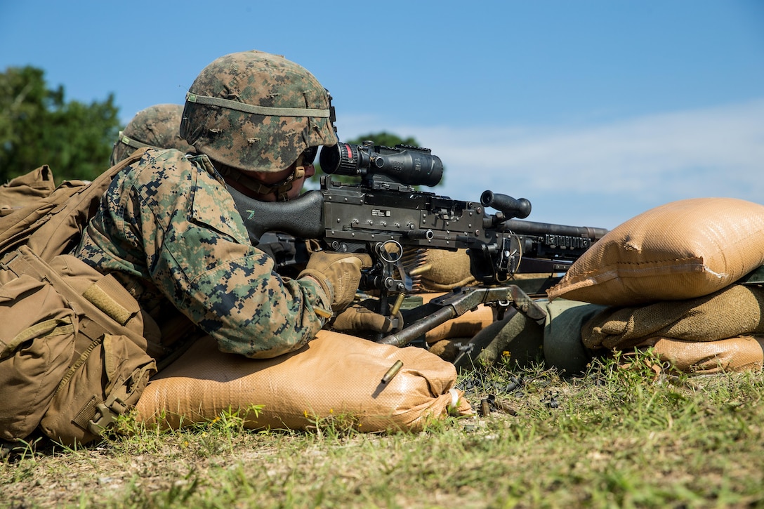 U.S. Marine Lance Cpl. Tyler D. Boyd, a machine gunner with Battalion Landing Team 2nd Battalion, 6th Marine Regiment, 26th Marine Expeditionary Unit (MEU), fires an M240B machine gun during a fire and movement range as part of Realistic Urban Training (RUT) at Camp Lejeune, N.C., Aug. 23, 2017.