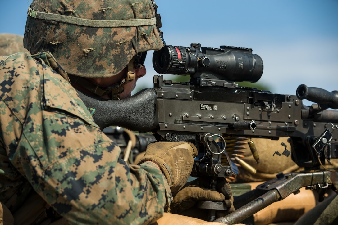 U.S. Marine Lance Cpl. Tyler D. Boyd, a machine gunner with Battalion Landing Team 2nd Battalion, 6th Marine Regiment, 26th Marine Expeditionary Unit (MEU), fires an M240B machine gun during a fire and movement range as part of Realistic Urban Training (RUT) at Camp Lejeune, N.C., Aug. 23, 2017.