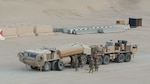 Soldiers with 215th Brigade Support Battalion, 3rd Armored Brigade Combat Team, 1st Cavalry Division conduct a hasty recovery of a vehicle as part of their convoy live-fire exercise at the Udairi Range, Kuwait Aug. 13-18. The sustainment battalion had the range built from scratch to help facilitate realistic scenarios and maximizing the training. (photo courtesy of 215th BSB)