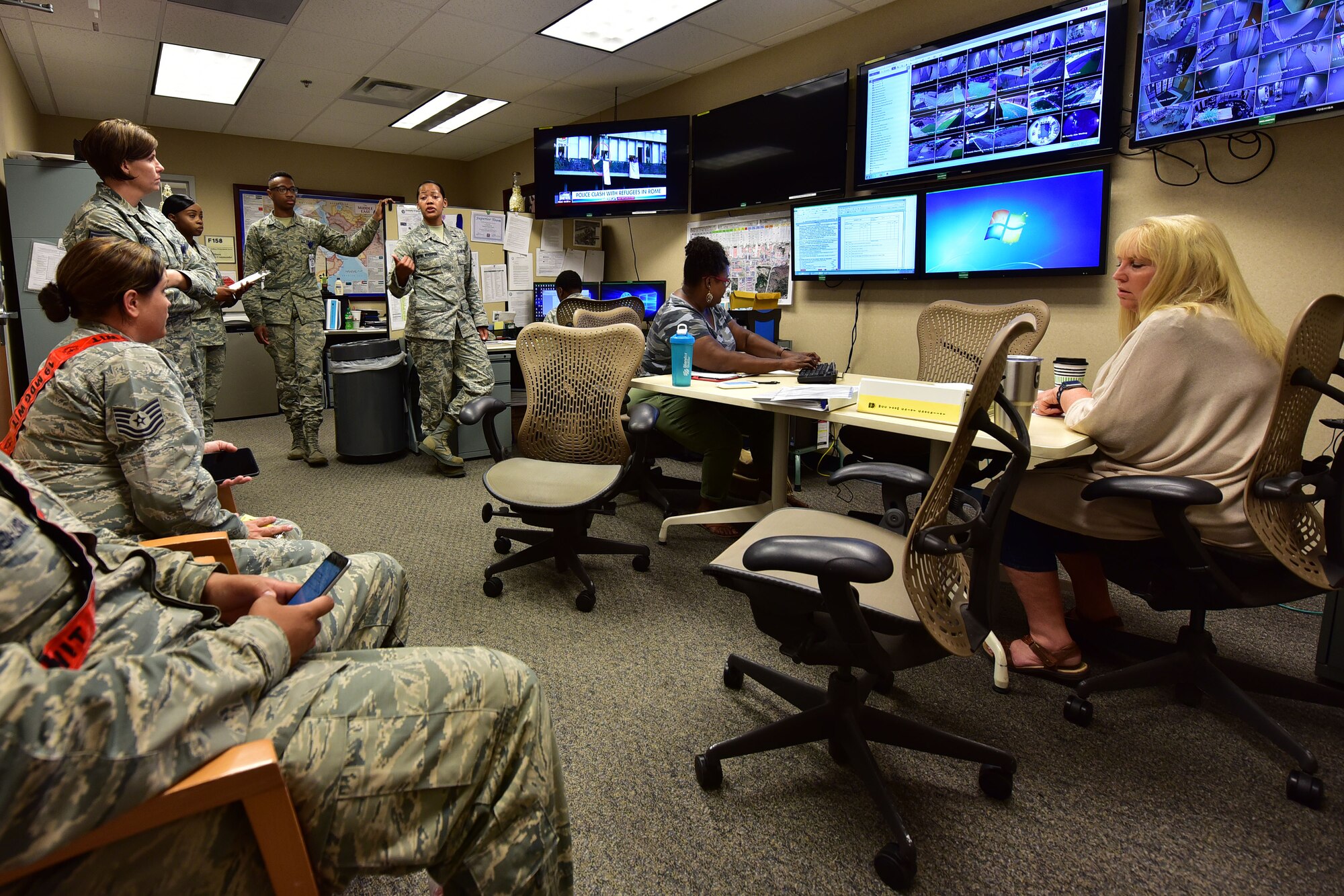 1st Lt. Hershall Gaffney Witherspoon, 19th Medical Support Squadron medical readiness flight commander, briefs the Medical Control Center, or MCC, on the current situation of an exercise underway August 24, 2017 at Little Rock Air Force Base, Ark. The MCC is in charge of correlating the different aspects of the 19th Medical Group during times of crisis. (U.S. Air Force photo by Airmen Rhett Isbell)