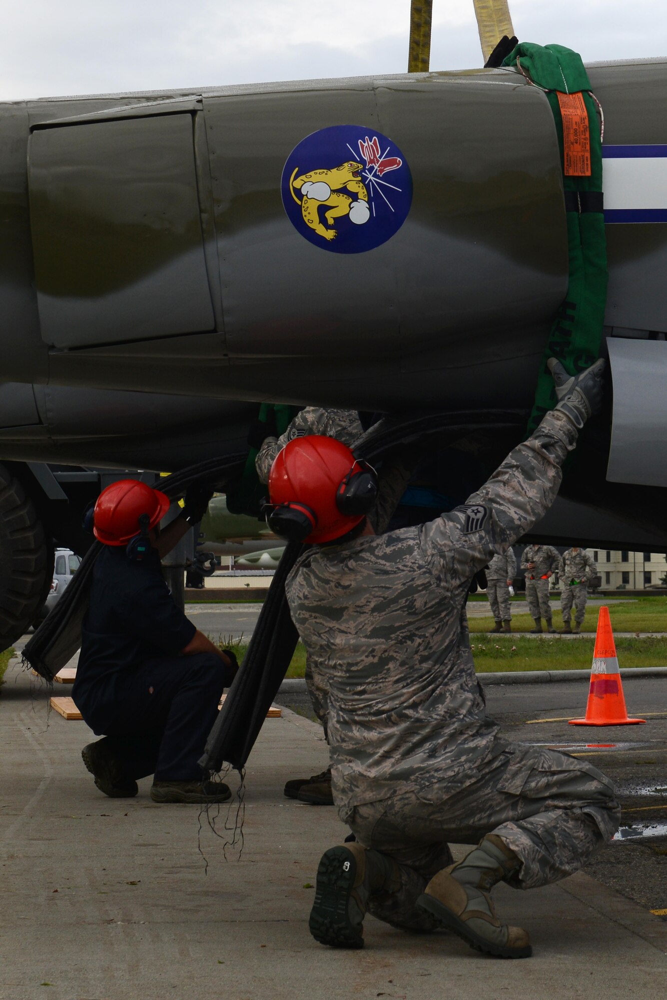 The 3rd Maintenance Squadron crash recovery team and 773d Civil Engineer Squadron structure shop return the newly refurbished Lockheed P-38 Lightning to the 3rd Wing at Joint Base Elmendorf-Richardson, Alaska, Aug. 26, 2017. The aircraft has been a static display at JBER since May of 2000 as a reminder of the sacrifices made in the ‘Forgotten War’ of the Aleutian Island chain; the restoration program started in August of 2016.