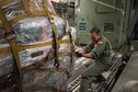 Master Sgt. Jesse Spainhour, a crew chief from the Tennessee Air Guard, pulls a pallet of equipment from the Kentucky Air Guard’s 123rd Contingency Response Group onto a C-17 Globemaster III at the Kentucky Air National Guard Base in Louisville, Kentucky, Aug. 29, 2017 in preparation for Hurricane Harvey rescue efforts in Texas. More than 40 Airmen from the Kentucky and Mississippi Air National Guard are deploying to George Bush Intercontinental Airport in Houston, where they will rapidly establish airfield, aeromedical evacuation and cargo operations. (U.S. Air National Guard  photo by Master Sgt. Phil Speck)