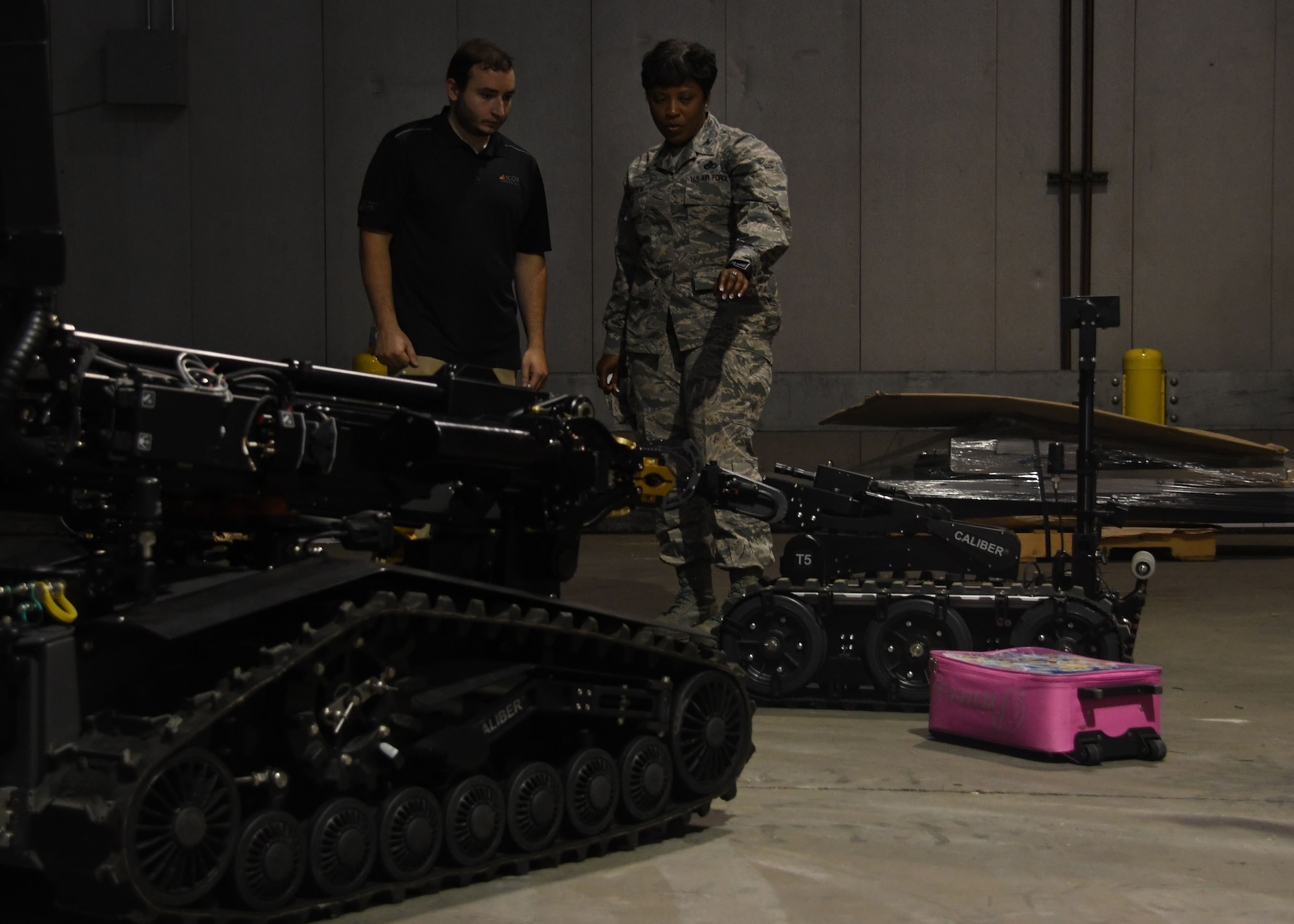 Col. Tanya Anderson, Air Force Civil Engineer Center Readiness Director at Tyndall Air Force Base, Fla., observes several explosive ordnance disposal robots at Dobbins Air Reserve Base, Ga, August 23, 2017. The robots were brought to Dobbins during an EOD Rodeo, and were used during several exercises between joint, community and coalition partners. (U.S. Air Force Photo/Staff Sgt. Miles Wilson)