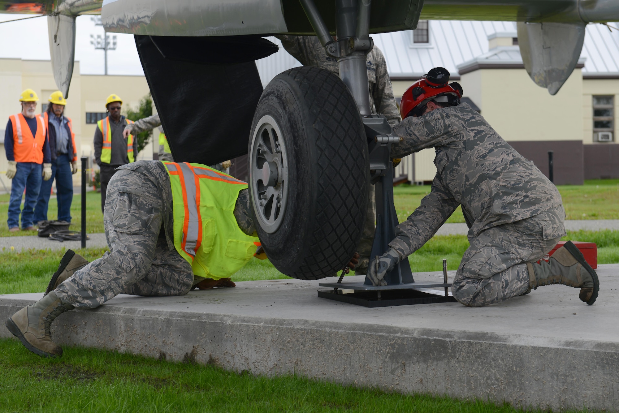 The 3rd Maintenance Squadron crash recovery team and 773d Civil Engineer Squadron structure shop return the newly refurbished Lockheed P-38 Lightning to the 3rd Wing at Joint Base Elmendorf-Richardson, Alaska, Aug. 26, 2017. The aircraft has been a static display at JBER since May of 2000 as a reminder of the sacrifices made in the ‘Forgotten War’ of the Aleutian Island chain; the restoration program started in August of 2016.