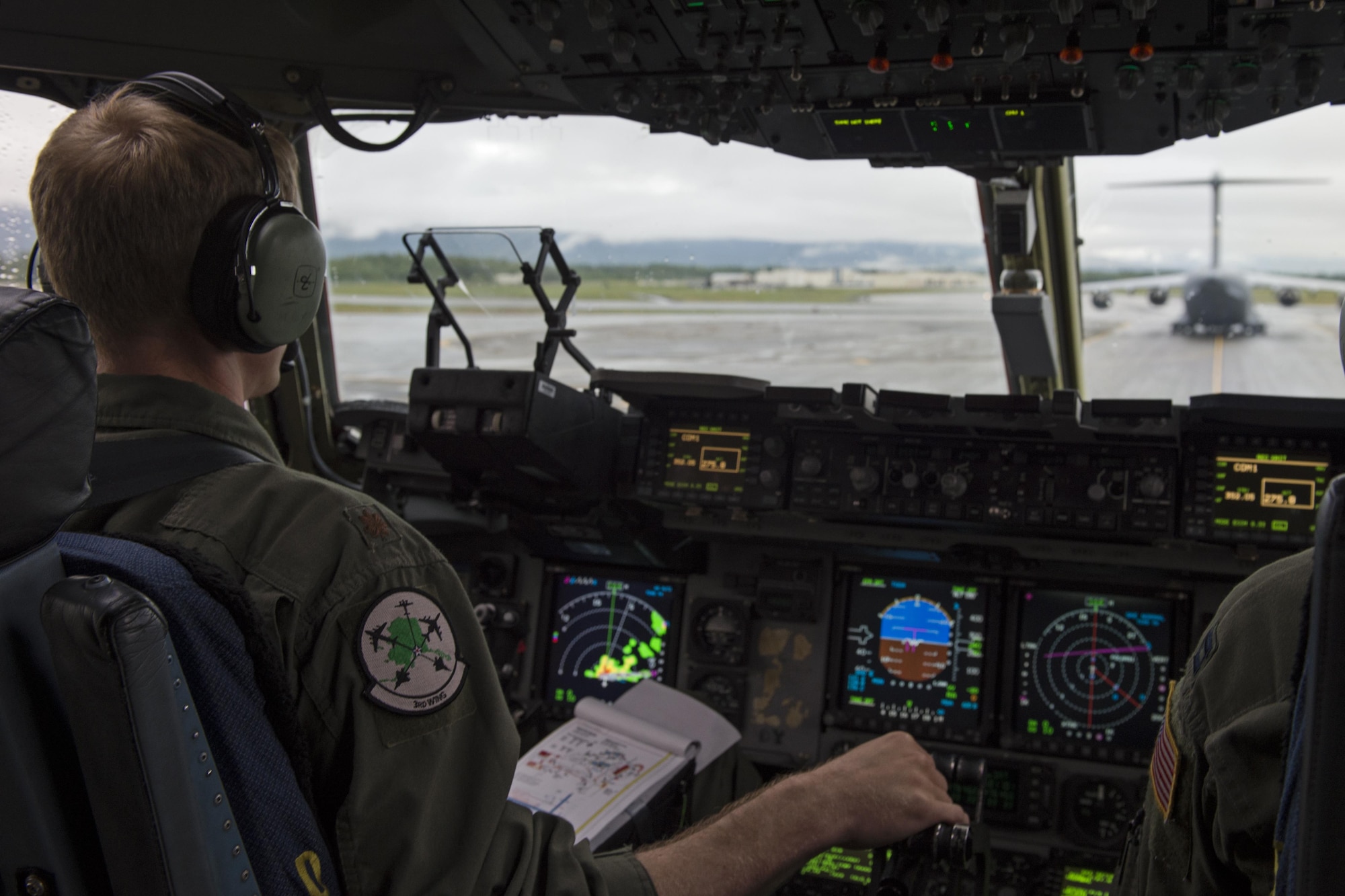 A pair of C-17 Globemaster III taxi for take-off, at the flightline at Joint Base Elmendorf-Richardson, Alaska, Aug. 24, 2017.