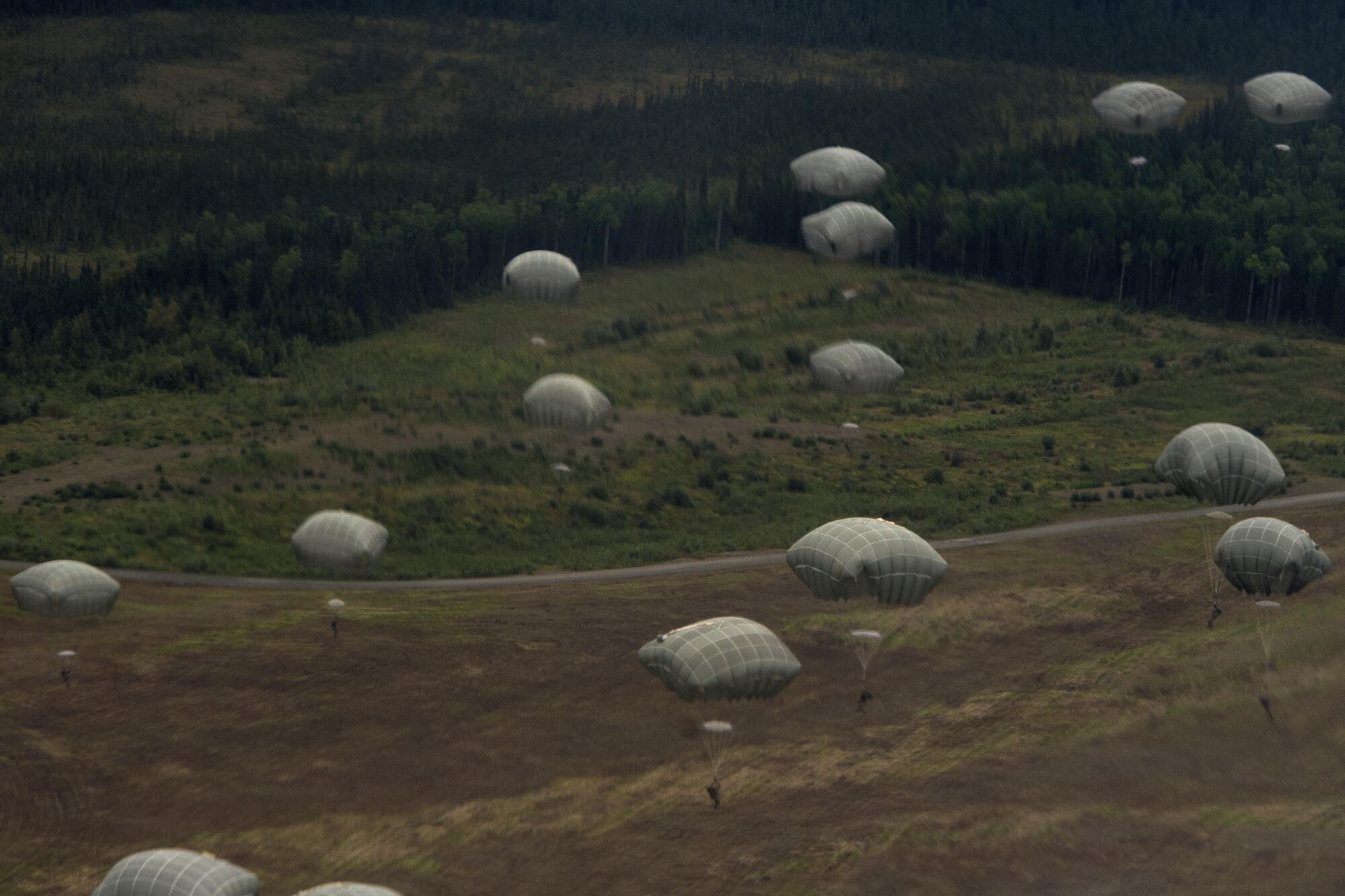 Paratroopers descend onto Malemute Drop Zone at Joint Base Elmendorf-Richardson, Alaska, Aug. 24, 2017.