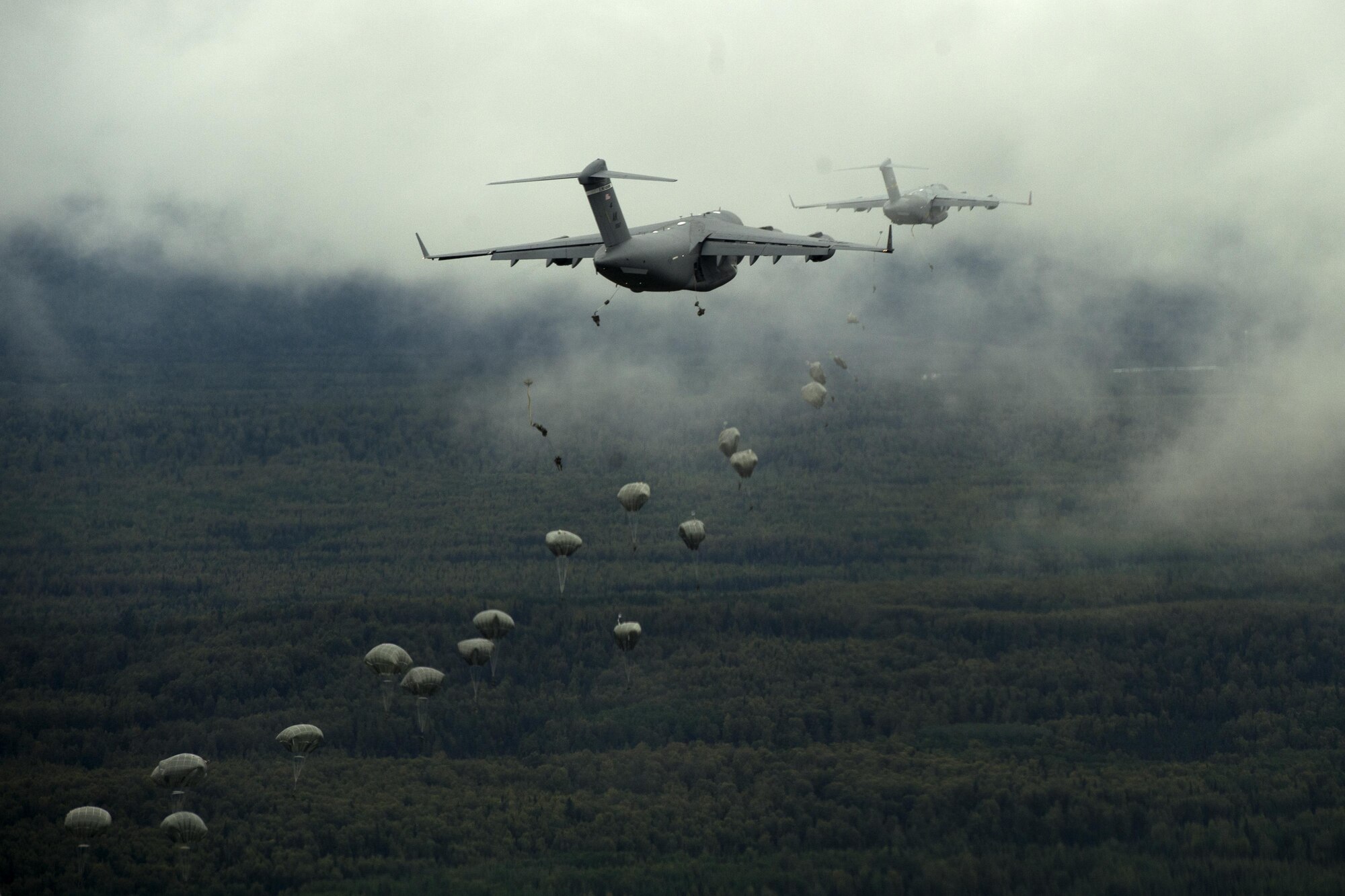 More than 390 paratroopers jumped out of C-17 Globemaster IIIs at Malemute Drop Zone, at Joint Base Elmendorf-Richardson, Alaska, Aug. 24, 2017.