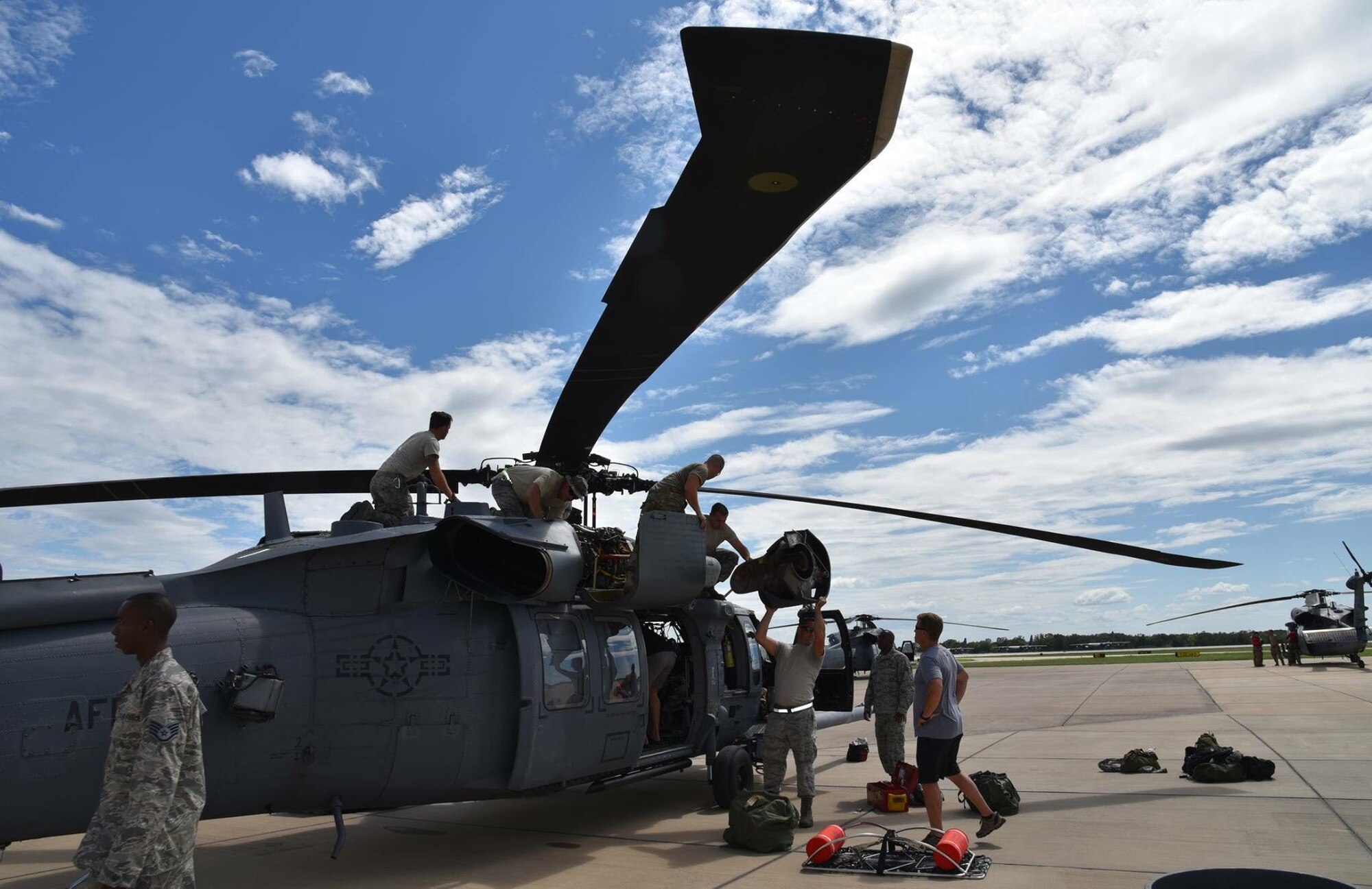 Aircraft maintainers from the 920th Rescue Wing, Patrick Air Force Base, Florida, work at getting an HH-60G Pave Hawk helicopter airport so crews can go rescue stranded people from the floodwaters in Texas. Approximately 94 Citizen Airmen have joined forces with their northern neighbors at Moody Air Force Base, Georgia, the 23rd Rescue Wing, and are operating out of College Station, Texas to rescue people affected by the aftermath of Hurricane Harvey in support of Air Force’s Northern search and rescue mission for FEMA disaster relief efforts. (U.S. Air Force photo)