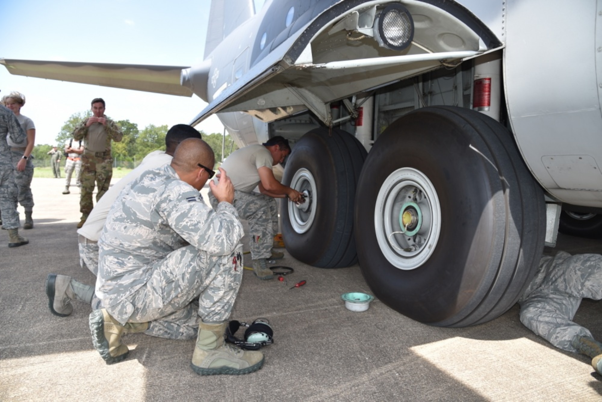A 920th HH-60G Pave Hawk helicopter crew refuels from a wing HC-130P/N King refueler in-between rescuing victims from the aftermath of Hurricane Harvey in Texas August 30, 2017. Approximately 94 Citizen Airmen have joined forces with their northern neighbors at Moody Air Force Base, Georgia, the 23rd Rescue Wing, and are operating out of College Station, Texas to rescue people affected by the aftermath of Hurricane Harvey in support of Air Force’s Northern search and rescue mission for FEMA disaster relief efforts. (U.S. Air Force photo)