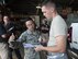 U.S. Air Force Staff Sgt. Leah Johnson and Airman 1st Class Colton Figura, 60th Aerial Port Squadron, Travis Air force 
Base, Calif., check over a form during a during a joint inspection training and practical demonstration performance evaluation Aug. 23, 2017, McClellan Park, Calif.The annual inspection is designed to help members of the California Urban Search and Rescue Task Force 7 team to learn about the JI process, governing directives and ensuring that cargo is safe before loading onto an aircraft. (U.S. Air Force photo/ Heide Couch)