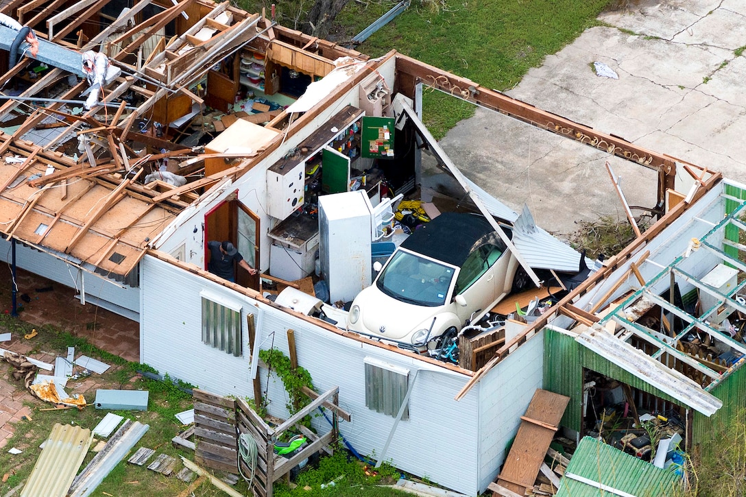 n aerial view showing massive devastation and flooding caused by Hurricane Harvey