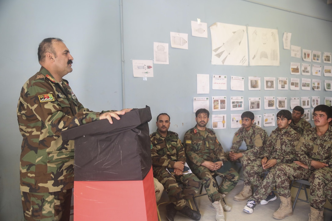 Afghan National Army Maj. Gen. Wali Mohammed Ahmadzai, the commanding general of 215th Corps, speaks to ANA soldiers during a graduation ceremony at Camp Shorabak, Afghanistan, Aug. 30, 2017. The event marked the end of an eight-week route clearance course, which taught approximately 70 soldiers with units from across Helmand province route clearance procedures to help enhance the mobility of supplies and infantry units throughout the region. (U.S. Marine Corps photo by Sgt. Lucas Hopkins)