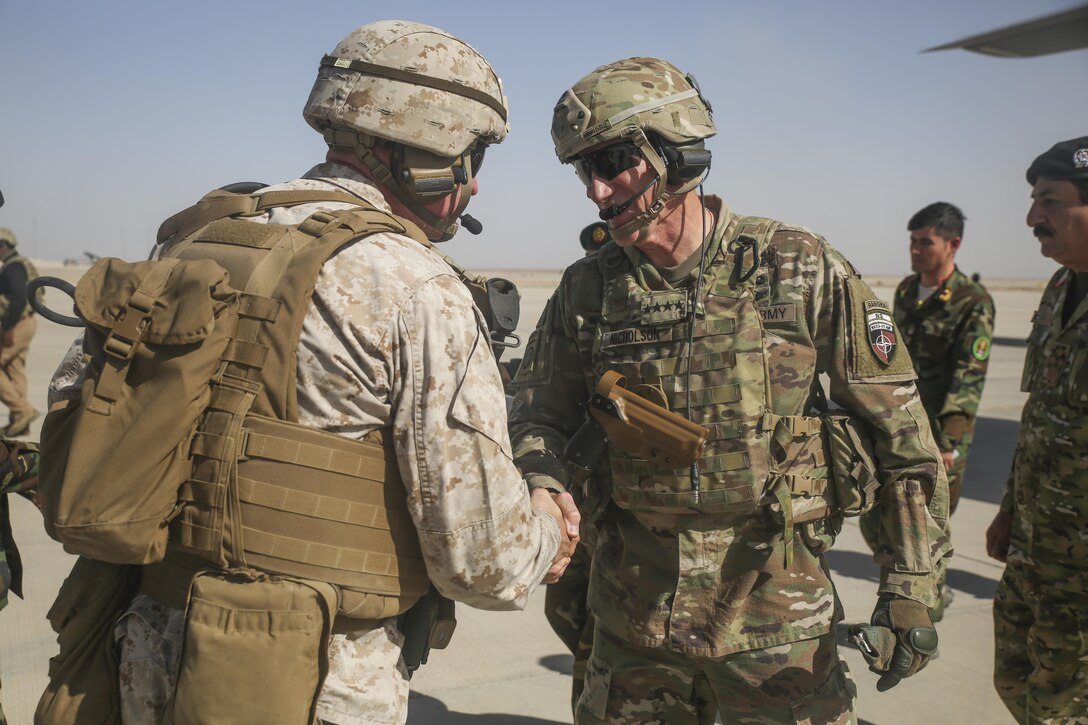 U.S. Marine Brig. Gen. Roger Turner, left, the commanding general of Task Force Southwest, greets U.S. Army Gen. John W. Nicholson, right, the commanding general of Resolute Support Mission, at Bastion Airfield, Afghanistan, Aug. 29, 2017. Nicholson’s visit to Helmand province was his first since Task Force Southwest took command as the province’s primary train, advise and assist element, and had an opportunity to meet with key Afghan leaders to discuss recent operational progress. (U.S. Marine Corps photo by Sgt. Lucas Hopkins)